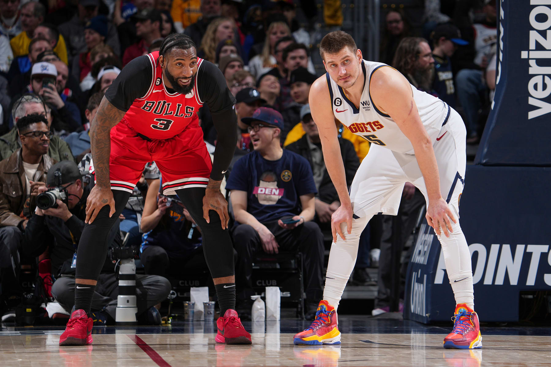 DENVER, CO - JANUARY 1: Andre Drummond #3 of the Chicago Bulls and Nikola Jokic #15 of the Denver Nuggets look on during the game on January 1, 2023 at the Ball Arena in Denver, Colorado. NOTE TO USER: User expressly acknowledges and agrees that, by downloading and/or using this Photograph, user is consenting to the terms and conditions of the Getty Images License Agreement. Mandatory Copyright Notice: Copyright 2023 NBAE (Photo by Bart Young/NBAE via Getty Images)