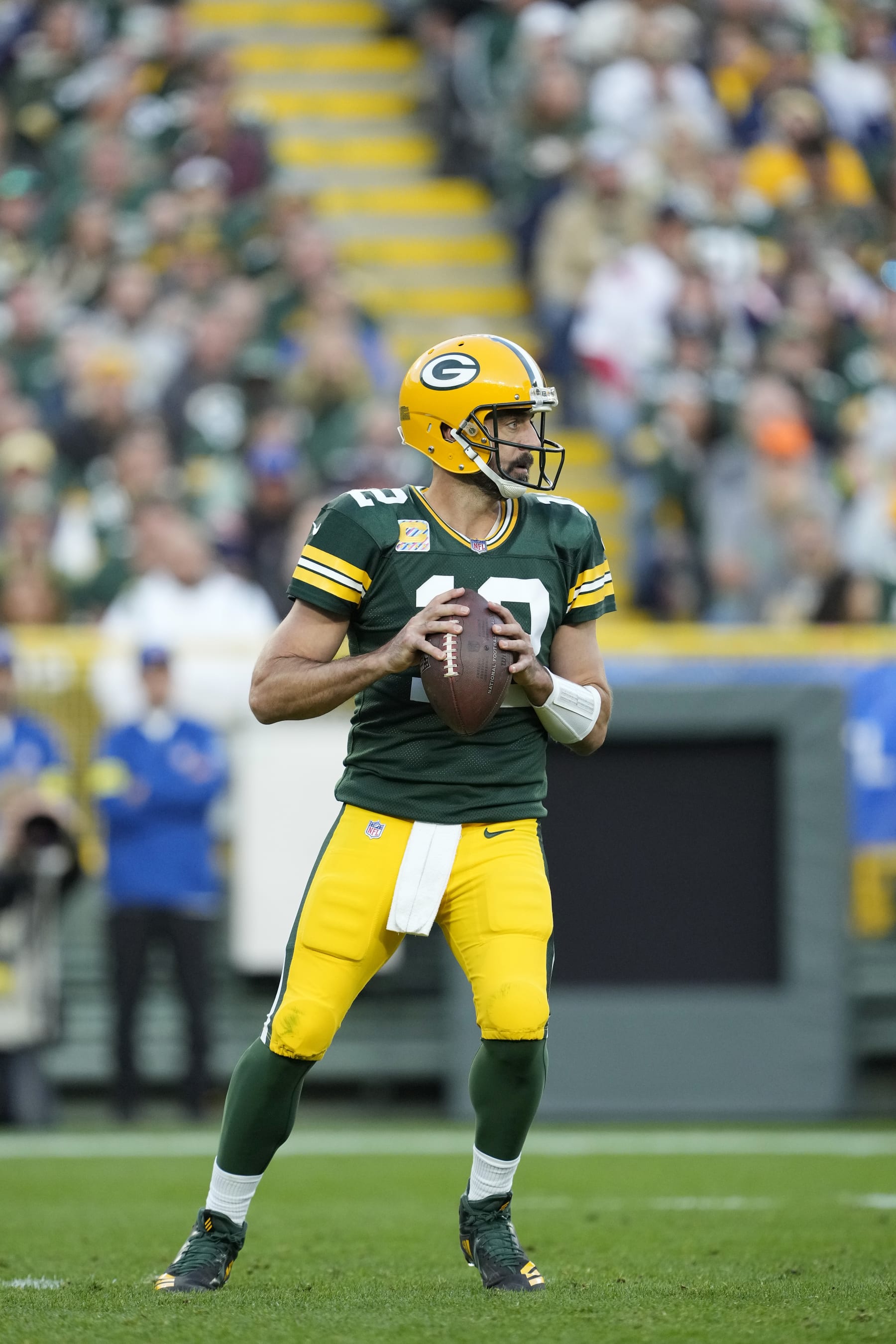 GREEN BAY, WISCONSIN - OCTOBER 02: Aaron Rodgers #12 of the Green Bay Packers throws a pass in the second half against the New England Patriots at Lambeau Field on October 02, 2022 in Green Bay, Wisconsin. (Photo by Patrick McDermott/Getty Images)
