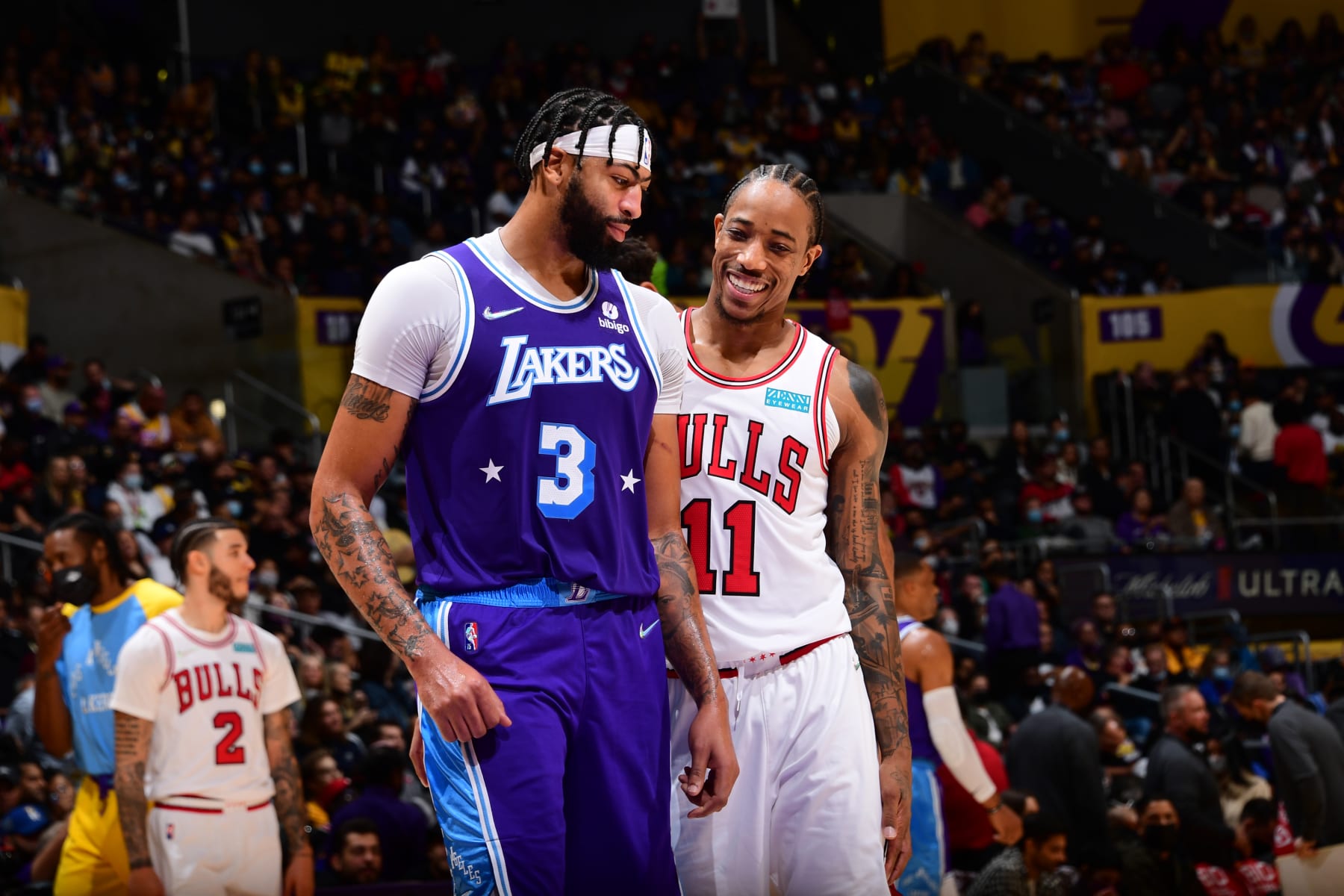 LOS ANGELES, CA - NOVEMBER 15: Anthony Davis #3 of the Los Angeles Lakers and DeMar DeRozan #11 of the Chicago Bulls talk during the game on November 15, 2021 at STAPLES Center in Los Angeles, California. NOTE TO USER: User expressly acknowledges and agrees that, by downloading and/or using this Photograph, user is consenting to the terms and conditions of the Getty Images License Agreement. Mandatory Copyright Notice: Copyright 2021 NBAE (Photo by Adam Pantozzi/NBAE via Getty Images)