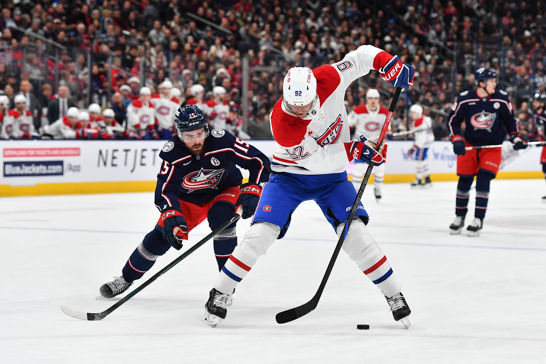 COLUMBUS, OHIO - DECEMBER 23: Patrik Laine #92 of the Montreal Canadiens skates with the puck as Dante Fabbro #15 of the Columbus Blue Jackets defends during the first period of a game at Nationwide Arena on December 23, 2024 in Columbus, Ohio. (Photo by Ben Jackson/Getty Images)