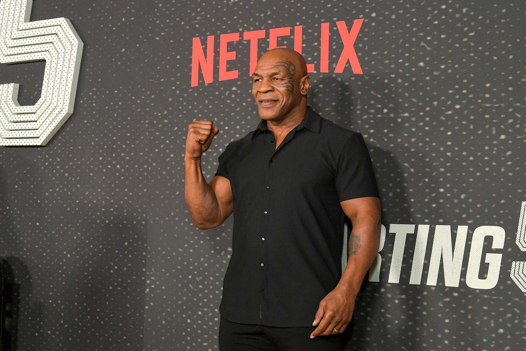 LOS ANGELES, CALIFORNIA - SEPTEMBER 23: Mike Tyson attends the Starting 5 LA Premiere at The Egyptian Theatre Hollywood on September 23, 2024 in Los Angeles, California.  (Photo by Charley Gallay/Getty Images for Netflix)