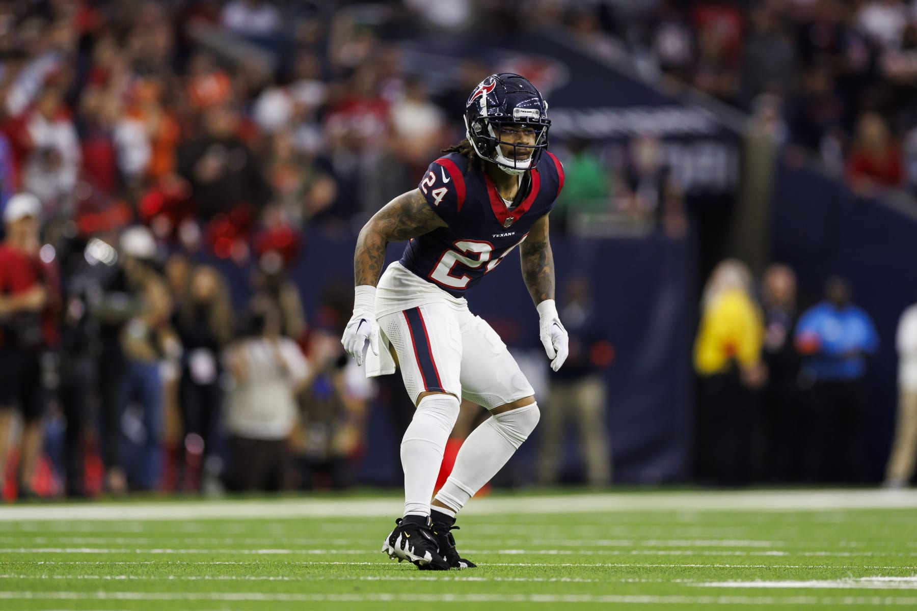 HOUSTON, TEXAS - JANUARY 13: Derek Stingley Jr. #24 of the Houston Texans defends in coverage during an AFC wild-card playoff football game against the Cleveland Browns at NRG Stadium on January 13, 2024 in Houston, Texas. (Photo by Ryan Kang/Getty Images)