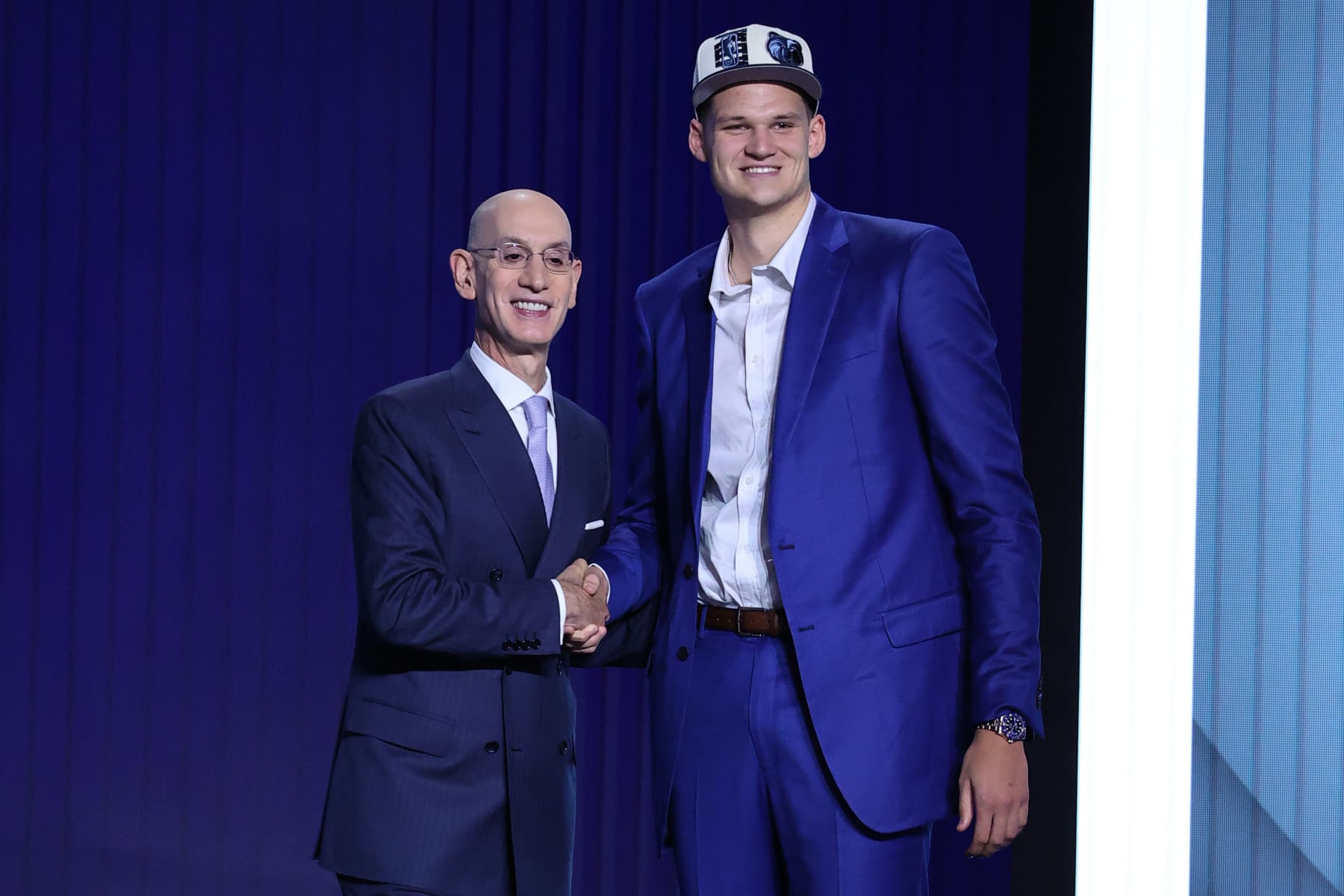 NEW YORK, NY - JUNE 23: Walker Kessler shakes hands with NBA Commissioner, Adam Silver (L) after being selected No. 22 overall by Memphis Grizzlies during the 2022 NBA Draft on June 23, 2022 at Barclays Center in Brooklyn, New York, United States.âââââââ (Photo by Tayfun Coskun/Anadolu Agency via Getty Images)