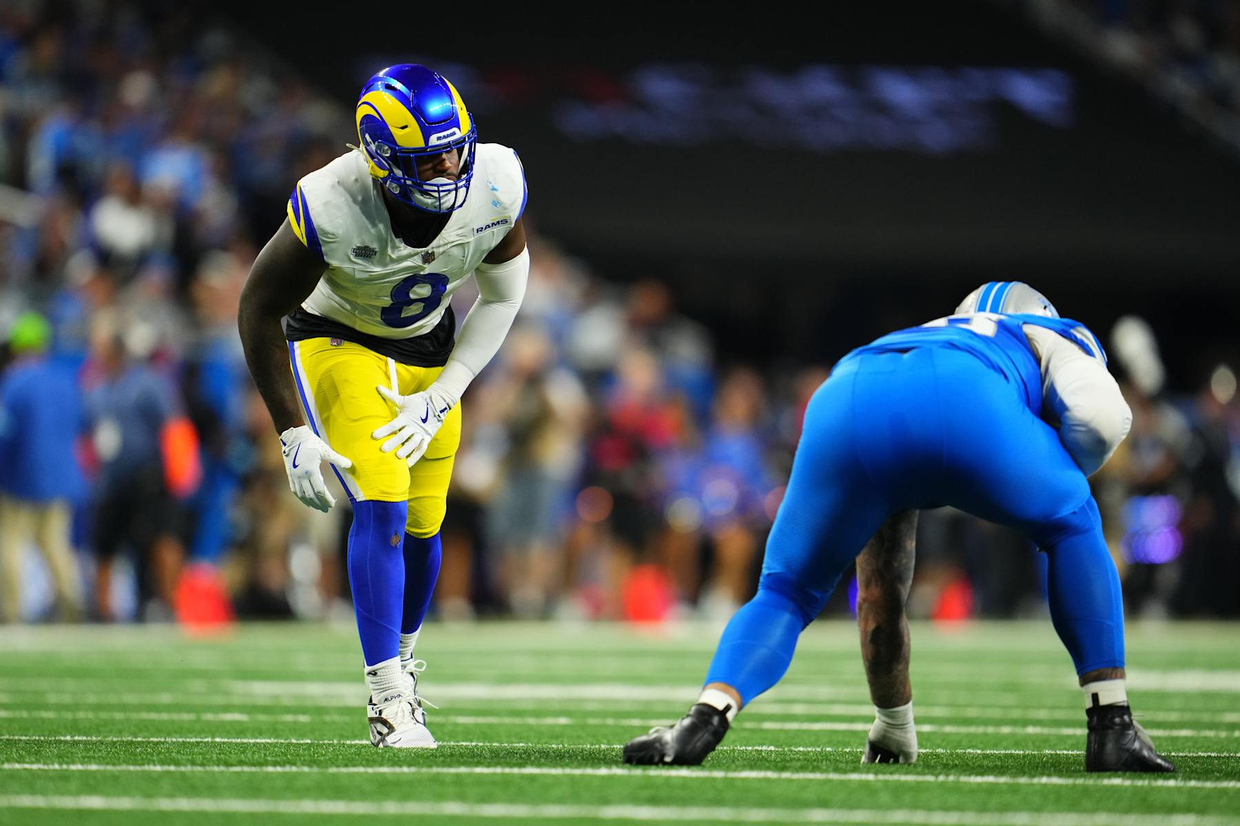 DETROIT, MI - SEPTEMBER 08: Jared Verse #8 of the Los Angeles Rams defends against the Detroit Lions during the first half of an football game at Ford Field on September 8, 2024 in Detroit, Michigan. (Photo by Cooper Neill/Getty Images)