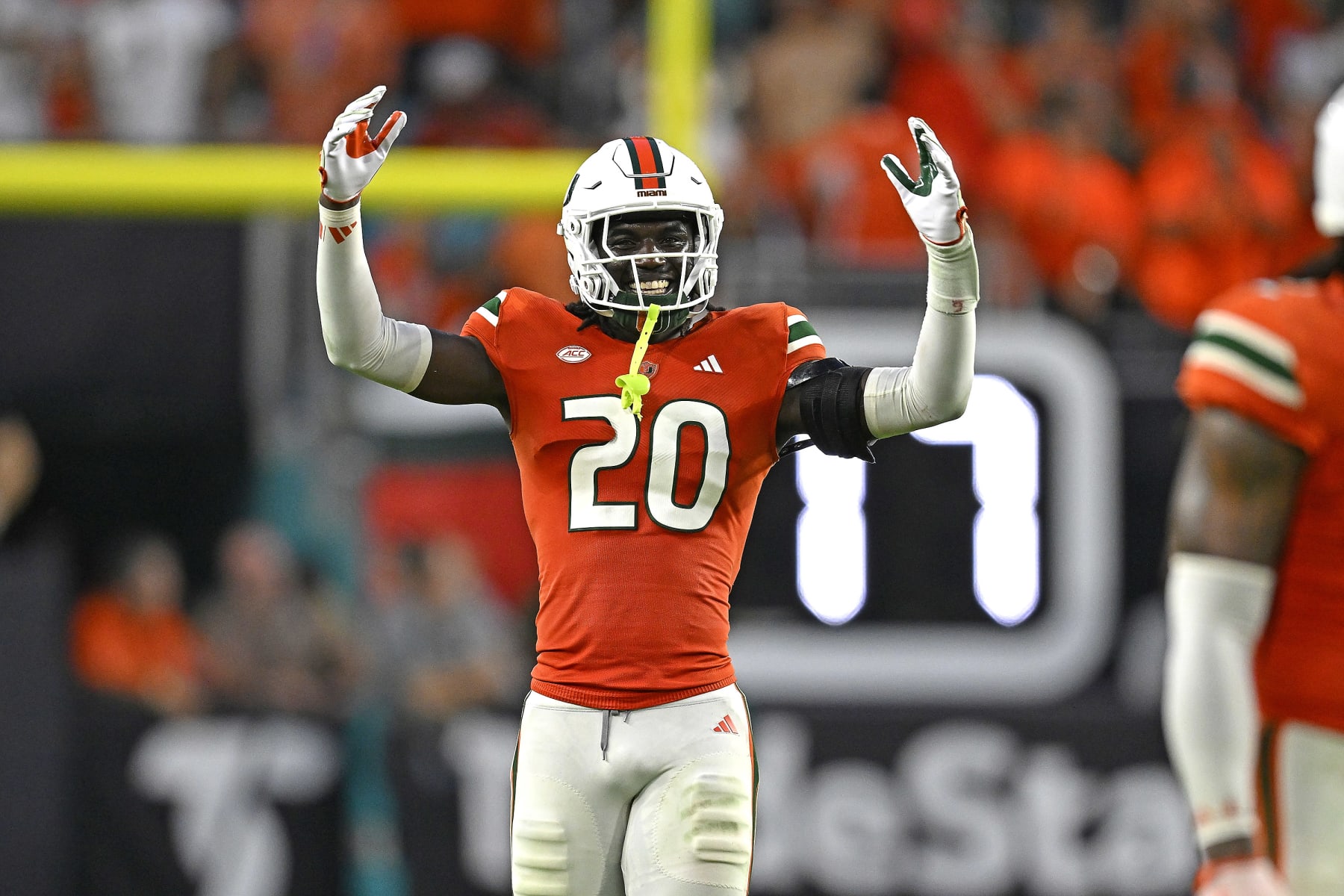 MIAMI GARDENS, FL - SEPTEMBER 09:  Miami safety James Williams (20) attempts to fire up the crowd in the fourth quarter as the Miami Hurricanes faced the Texas A&M Aggies on September 9, 2023, at Hard Rock Stadium in Miami Gardens, Florida. (Photo by Samuel Lewis/Icon Sportswire via Getty Images)