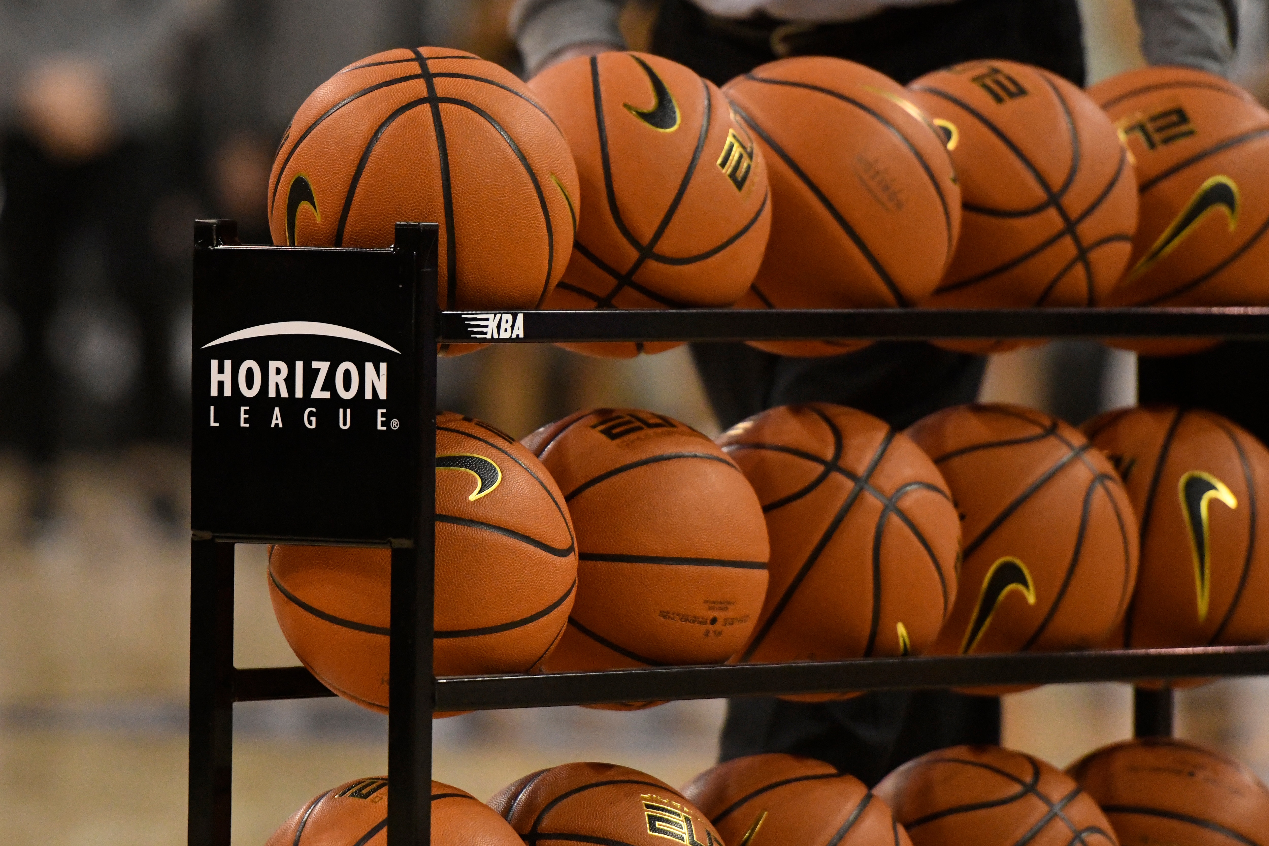 INDIANAPOLIS, IN - MARCH 08: A Horizon League logo is seen on the side of a cart of basketballs before the Horizon League Tournament Championship game between the Northern Kentucky Norse and the Wright State Raiders on March 8, 2022, at the Indiana Farmers Coliseum in Indianapolis, Indiana. (Photo by Michael Allio/Icon Sportswire via Getty Images)