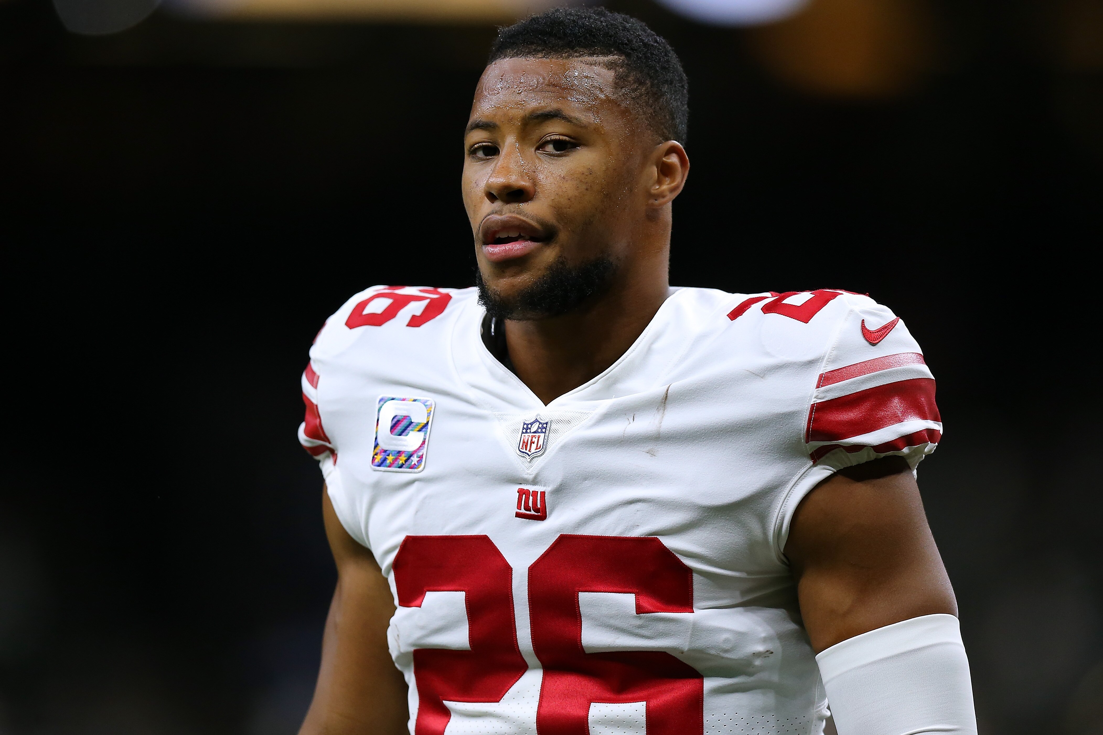 NEW ORLEANS, LOUISIANA - OCTOBER 03: Saquon Barkley #26 of the New York Giants warms up before a game against the New Orleans Saints at the Caesars Superdome on October 03, 2021 in New Orleans, Louisiana. (Photo by Jonathan Bachman/Getty Images)