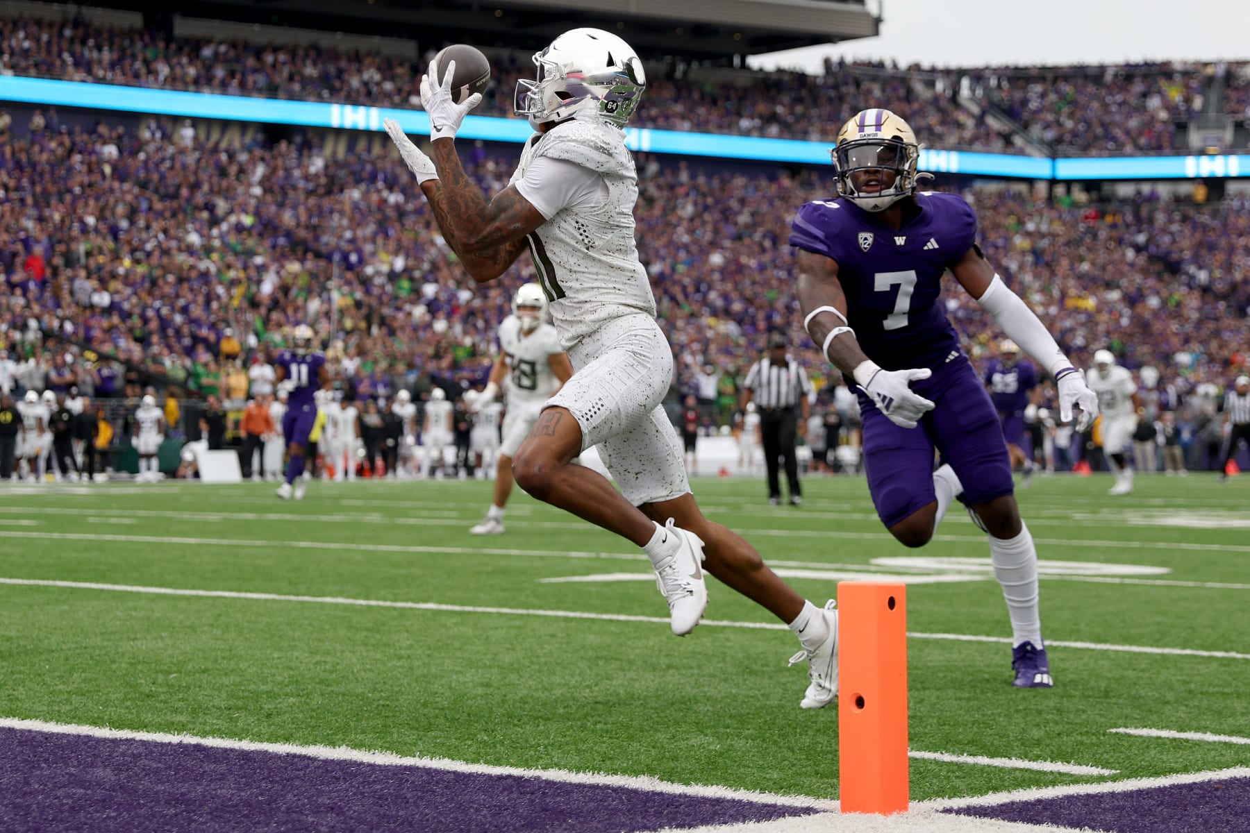 SEATTLE, WASHINGTON - OCTOBER 14: Troy Franklin #11 of the Oregon Ducks catches a touchdown against the Washington Huskies during the third quarter at Husky Stadium on October 14, 2023 in Seattle, Washington. (Photo by Steph Chambers/Getty Images)