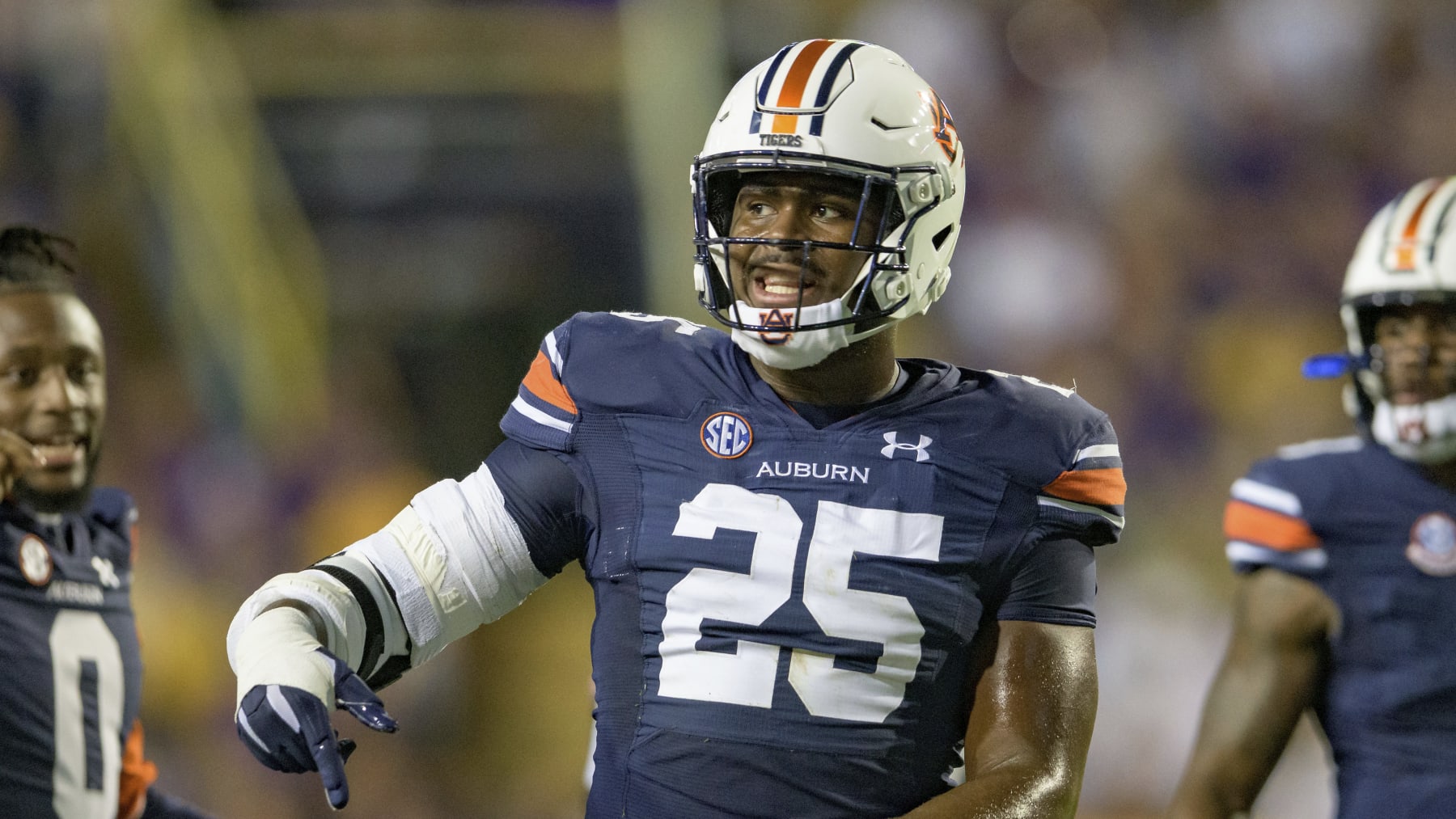 Auburn defensive end Colby Wooden (25) reacts during an NCAA football game against LSU on Saturday, Oct. 2, 2021, in Baton Rouge, La. (AP Photo/Matthew Hinton)