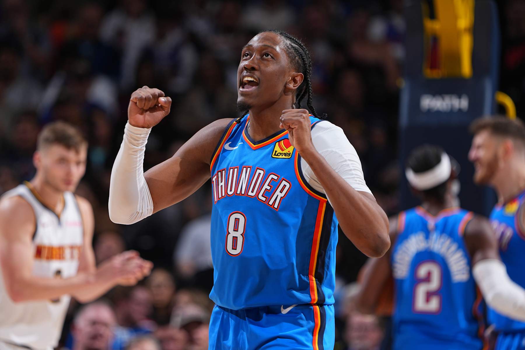 DENVER, CO - OCTOBER 15: Jalen Williams #8 of the Oklahoma City Thunder celebrates during the game against the Denver Nuggets during a NBA preseason game on October 15, 2024 at Ball Arena in Denver, Colorado. NOTE TO USER: User expressly acknowledges and agrees that, by downloading and/or using this Photograph, user is consenting to the terms and conditions of the Getty Images License Agreement. Mandatory Copyright Notice: Copyright 2024 NBAE (Photo by Garrett Ellwood/NBAE via Getty Images)
