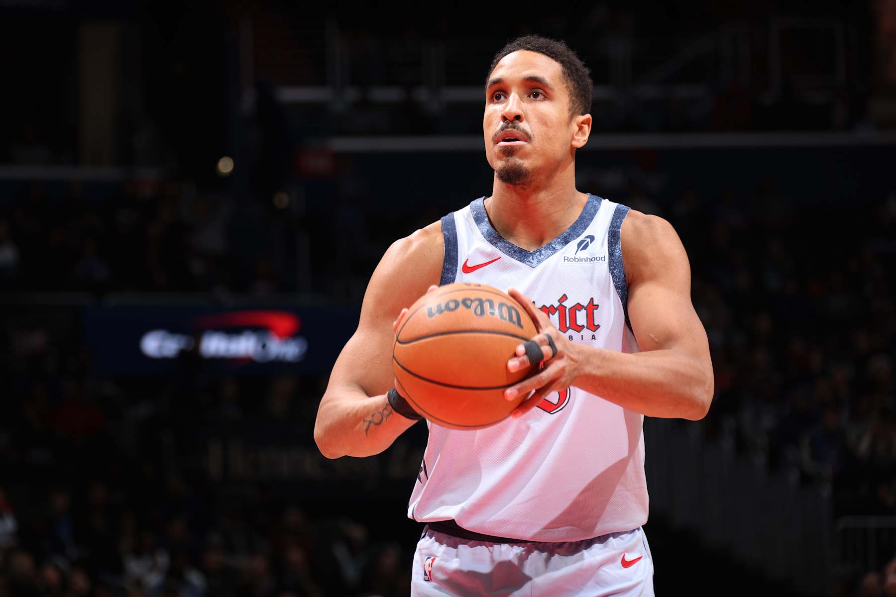 WASHINGTON, D.C. - DECEMBER 5: Malcolm Brogdon #15 of the Washington Wizards shoots a free throw during the game against the Dallas Mavericks on December 5, 2024 at Entertainment and Sports Arena in Washington, D.C. NOTE TO USER: User expressly acknowledges and agrees that, by downloading and or using this photograph, User is consenting to the terms and conditions of the Getty Images License Agreement. Mandatory Copyright Notice: Copyright 2024 NBAE (Photo by Stephen Gosling/NBAE via Getty Images)