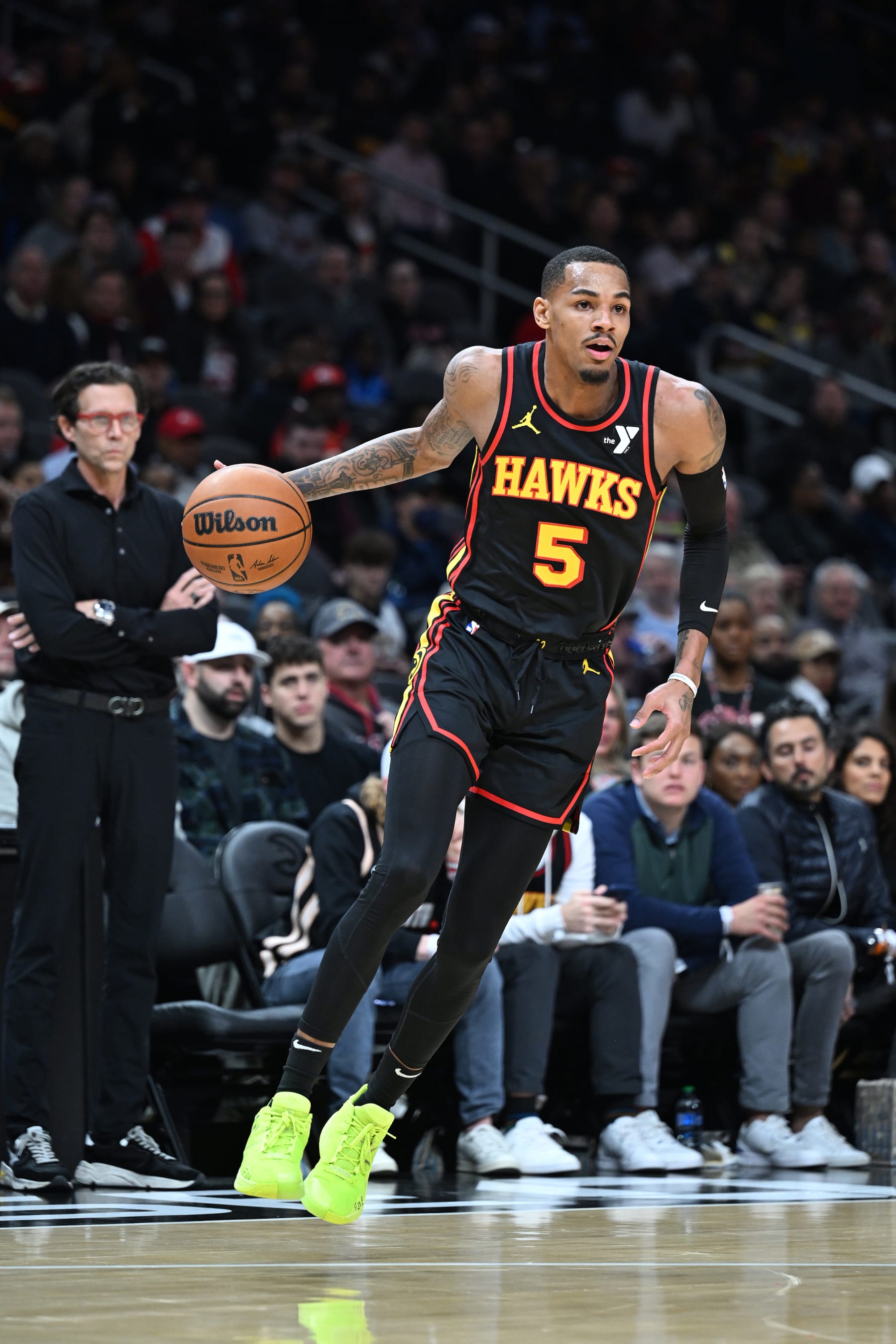 ATLANTA, GA - JANUARY 12: Dejounte Murray #5 of the Atlanta Hawks dribbles the ball during the game against the Indiana Pacers on January 12, 2024 at State Farm Arena in Atlanta, Georgia.  NOTE TO USER: User expressly acknowledges and agrees that, by downloading and/or using this Photograph, user is consenting to the terms and conditions of the Getty Images License Agreement. Mandatory Copyright Notice: Copyright 2024 NBAE (Photo by Adam Hagy/NBAE via Getty Images)