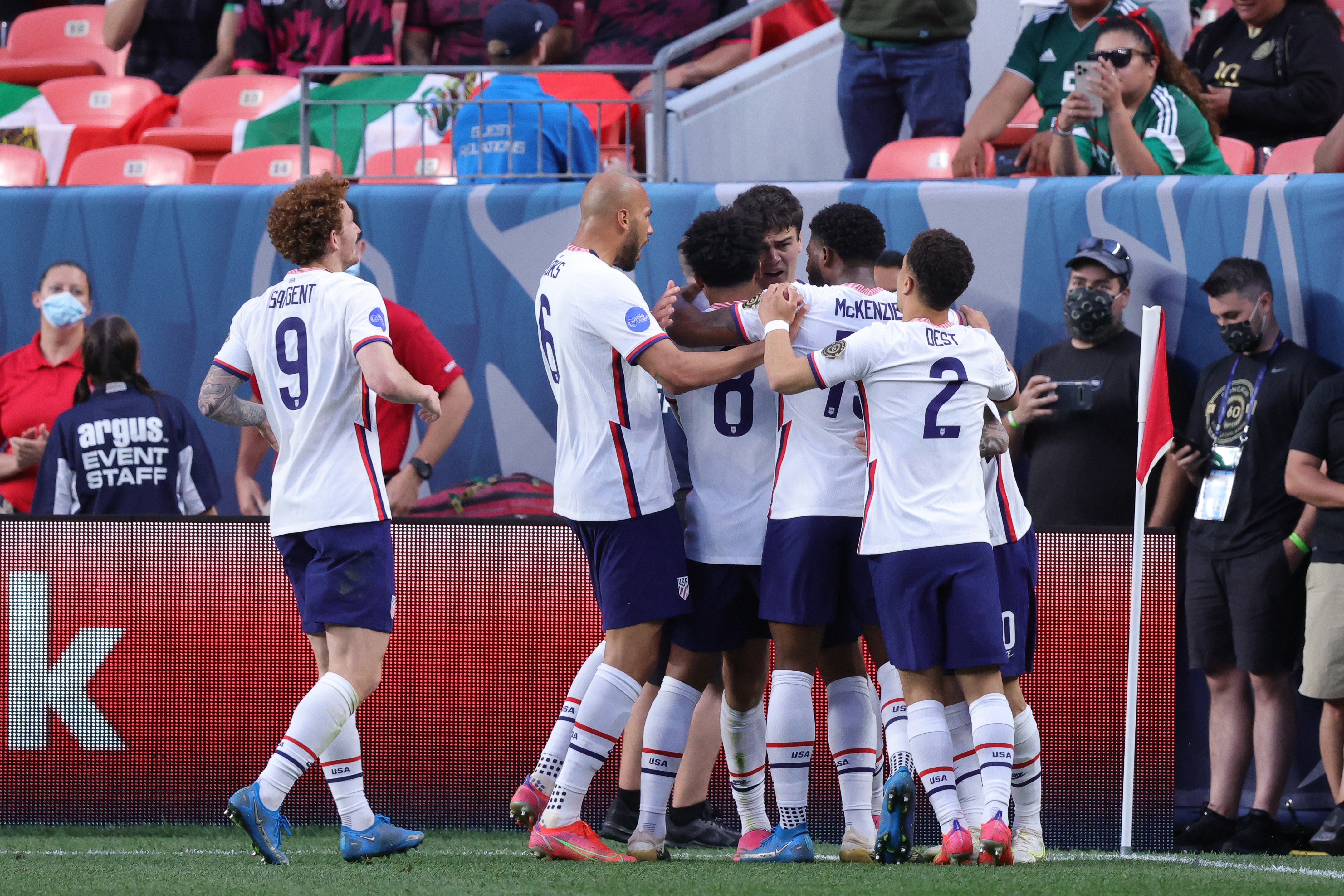DENVER, CO - JUNE 06: United States forward Gio Reyna (7) celebrates with teammates after scoring a goal in action during the CONCACAF Nations League finals between Mexico and the United States on June 06, 2021, at Empower Field at Mile High in Denver, CO. (Photo by Robin Alam/Icon Sportswire via Getty Images)