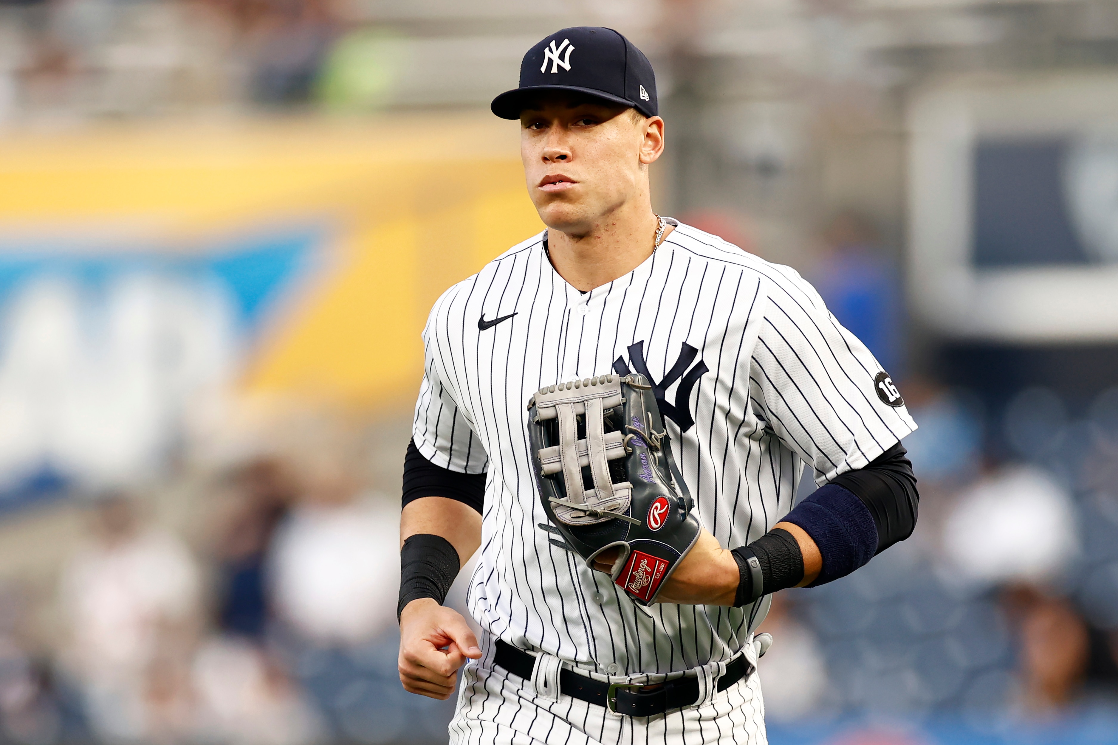 NEW YORK, NY - MAY 25: Aaron Judge #99 of the New York Yankees runs to the dugout against the Toronto Blue Jays during the third inning at Yankee Stadium on May 25, 2021 in the Bronx borough of New York City. (Photo by Adam Hunger/Getty Images)