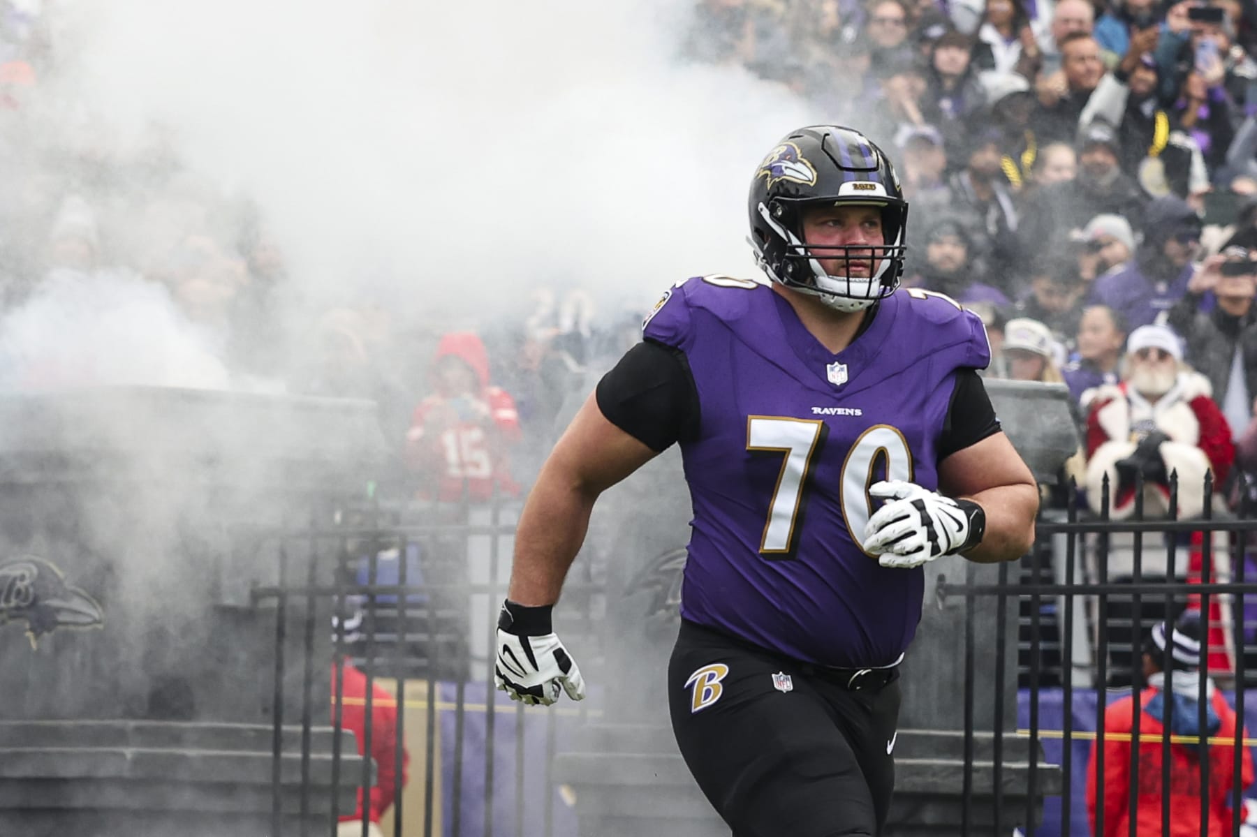 BALTIMORE, MD - JANUARY 28: Kevin Zeitler #70 of the Baltimore Ravens runs out of the tunnel prior to the AFC Championship NFL football game against the Kansas City Chiefs at M&T Bank Stadium on January 28, 2024 in Baltimore, Maryland. (Photo by Perry Knotts/Getty Images)