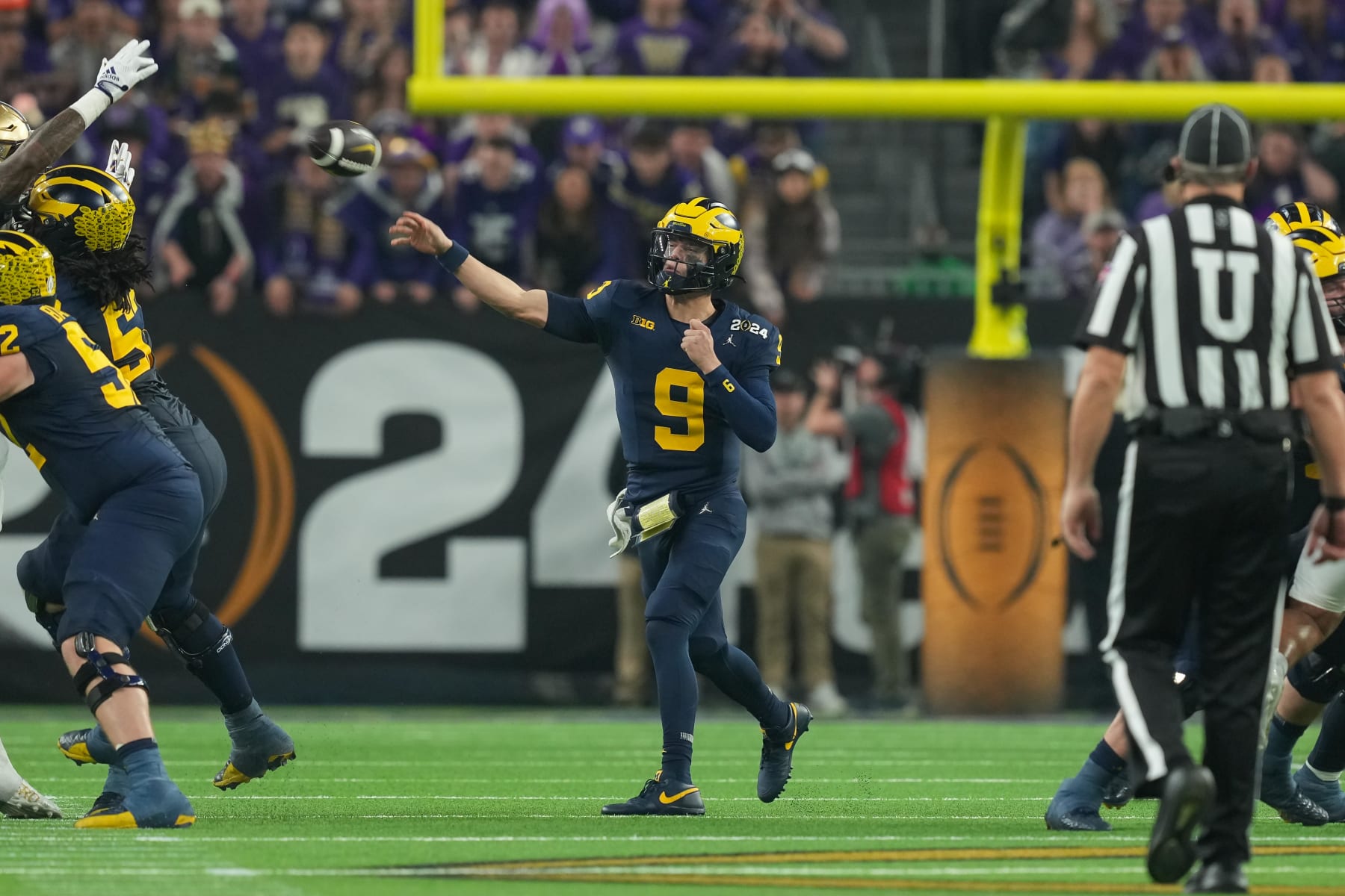 HOUSTON, TX - JANUARY 08: Michigan Wolverines quarterback J.J. McCarthy (9) throws a pass during the CFP National Championship game between the Michigan Wolverines and Washington Huskies on January 8, 2024 at NRG Stadium in Houston, Texas. (Photo by Daniel Dunn/Icon Sportswire via Getty Images)