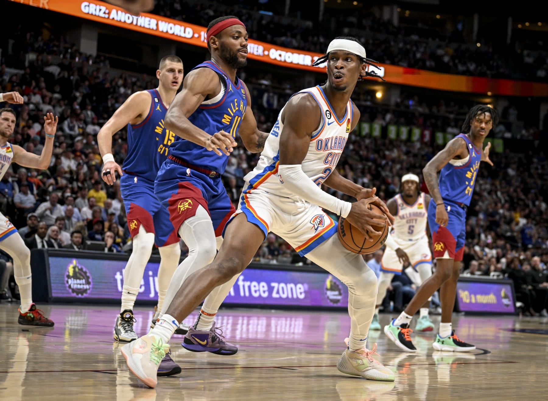 DENVER, CO - OCTOBER 22: Bruce Brown (11) of the Denver Nuggets defends Shai Gilgeous-Alexander (2) of the Oklahoma City Thunder during the third quarter on Saturday, October 22, 2022. (Photo by AAron Ontiveroz/MediaNews Group/The Denver Post via Getty Images)