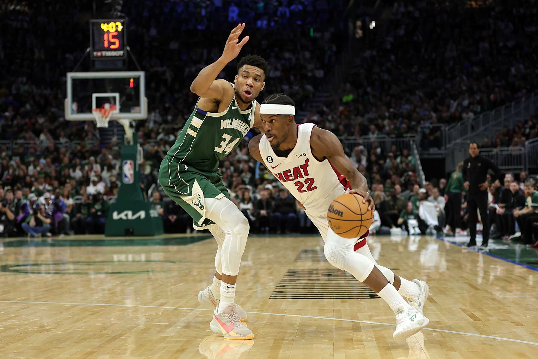 MILWAUKEE, WISCONSIN - APRIL 26: Jimmy Butler #22 of the Miami Heat drives around Giannis Antetokounmpo #34 of the Milwaukee Bucks during the second half of Game 5 of the Eastern Conference First Round Playoffs at Fiserv Forum on April 26, 2023 in Milwaukee, Wisconsin. NOTE TO USER: User expressly acknowledges and agrees that, by downloading and or using this photograph, User is consenting to the terms and conditions of the Getty Images License Agreement. (Photo by Stacy Revere/Getty Images)