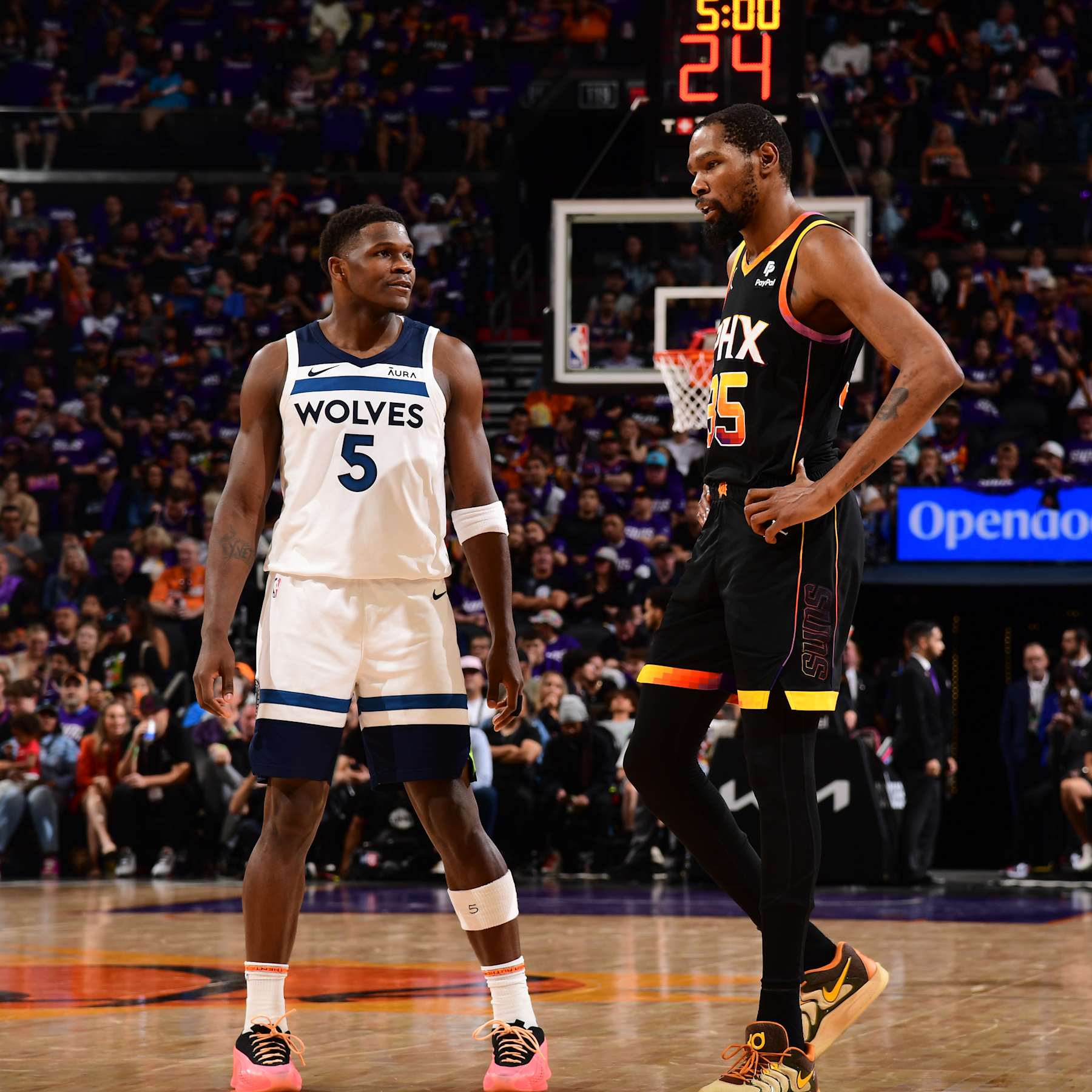 PHOENIX, AZ - APRIL  28: Kevin Durant #35 of the Phoenix Suns talks with Anthony Edwards #5 of the Minnesota Timberwolves during the game during Round 1 Game 4 of the 2024 NBA Playoffs on April 28, 2024 at Footprint Center in Phoenix, Arizona. NOTE TO USER: User expressly acknowledges and agrees that, by downloading and or using this photograph, user is consenting to the terms and conditions of the Getty Images License Agreement. Mandatory Copyright Notice: Copyright 2024 NBAE (Photo by Kate Frese/NBAE via Getty Images)