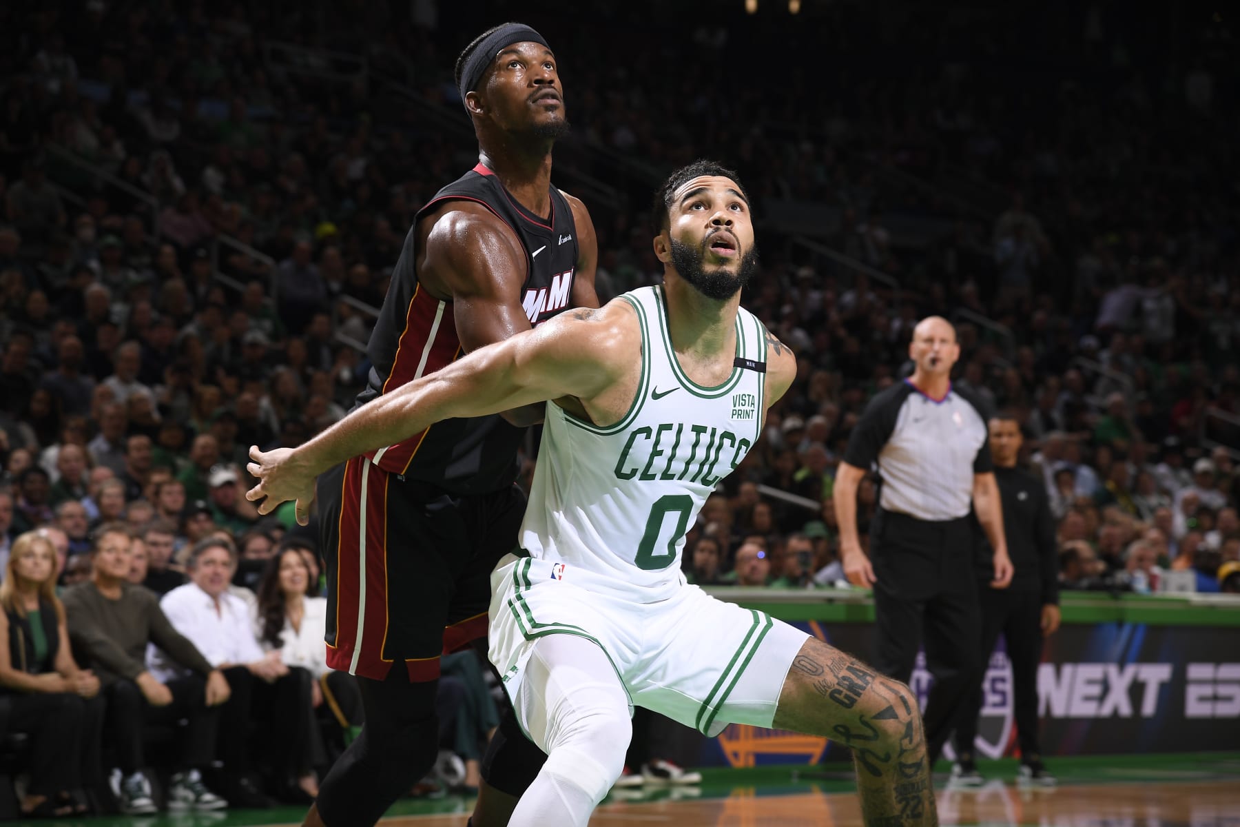 BOSTON, MA - OCTOBER 27: Jayson Tatum #0 of the Boston Celtics and Jimmy Butler #22 of the Miami Heat wait for the rebound during the game on October 27, 2023 at the TD Garden in Boston, Massachusetts. NOTE TO USER: User expressly acknowledges and agrees that, by downloading and or using this photograph, User is consenting to the terms and conditions of the Getty Images License Agreement. Mandatory Copyright Notice: Copyright 2023 NBAE  (Photo by Brian Babineau/NBAE via Getty Images)