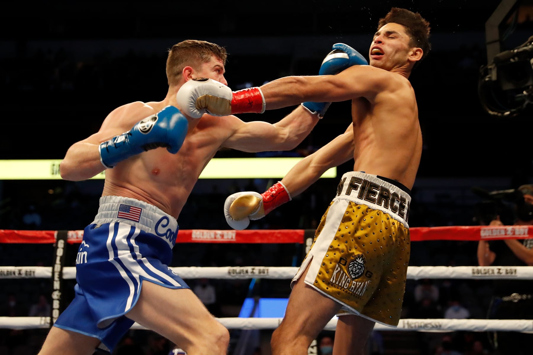 DALLAS, TEXAS - JANUARY 02: Luke Campbell (L) knocks Ryan Garcia down with a left hook during the WBC Interim Lightweight Title fight at American Airlines Center on January 02, 2021 in Dallas, Texas. (Photo by Tim Warner/Getty Images)