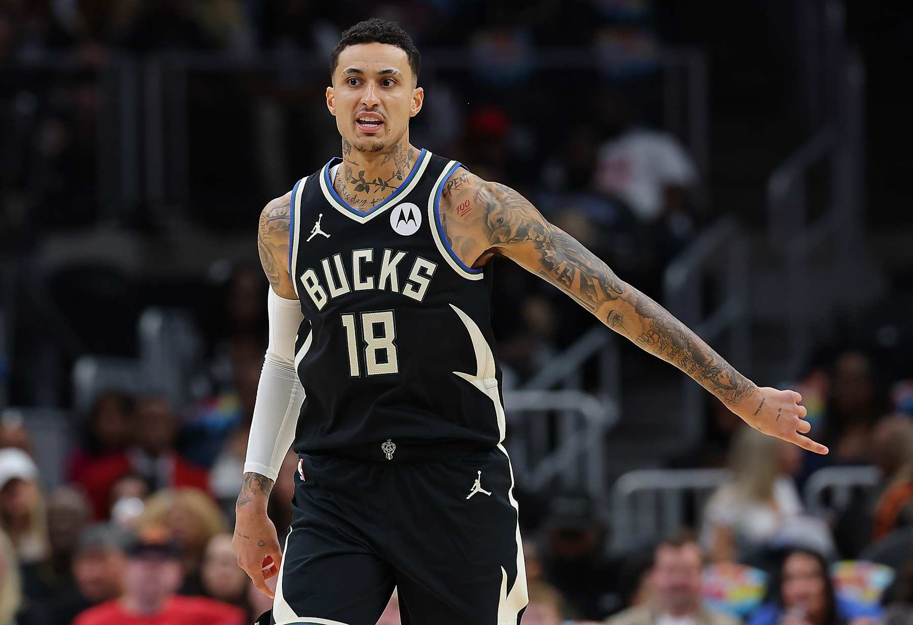 ATLANTA, GEORGIA - FEBRUARY 07:  Kyle Kuzma #18 of the Milwaukee Bucks reacts on defense against the Atlanta Hawks during the first quarter at State Farm Arena on February 07, 2025 in Atlanta, Georgia.  NOTE TO USER: User expressly acknowledges and agrees that, by downloading and or using this photograph, User is consenting to the terms and conditions of the Getty Images License Agreement. (Photo by Kevin C. Cox/Getty Images)