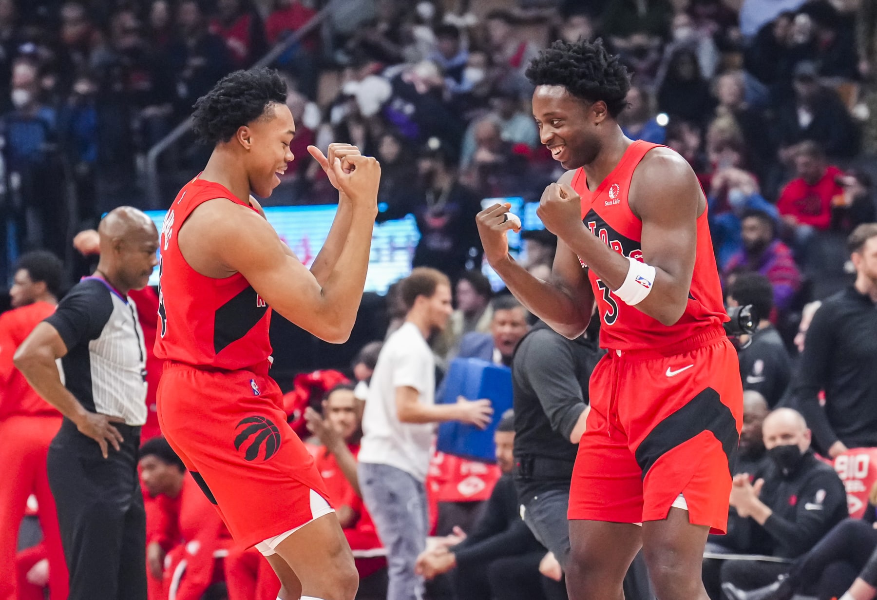 TORONTO, ON - MARCH 26: OG Anunoby #3 and Scottie Barnes #4 of the Toronto Raptors smile before tip-off against the Indiana Pacers in  their basketball game at the Scotiabank Arena on March 26, 2022 in Toronto, Ontario, Canada. NOTE TO USER: User expressly acknowledges and agrees that, by downloading and/or using this Photograph, user is consenting to the terms and conditions of the Getty Images License Agreement. (Photo by Mark Blinch/Getty Images)