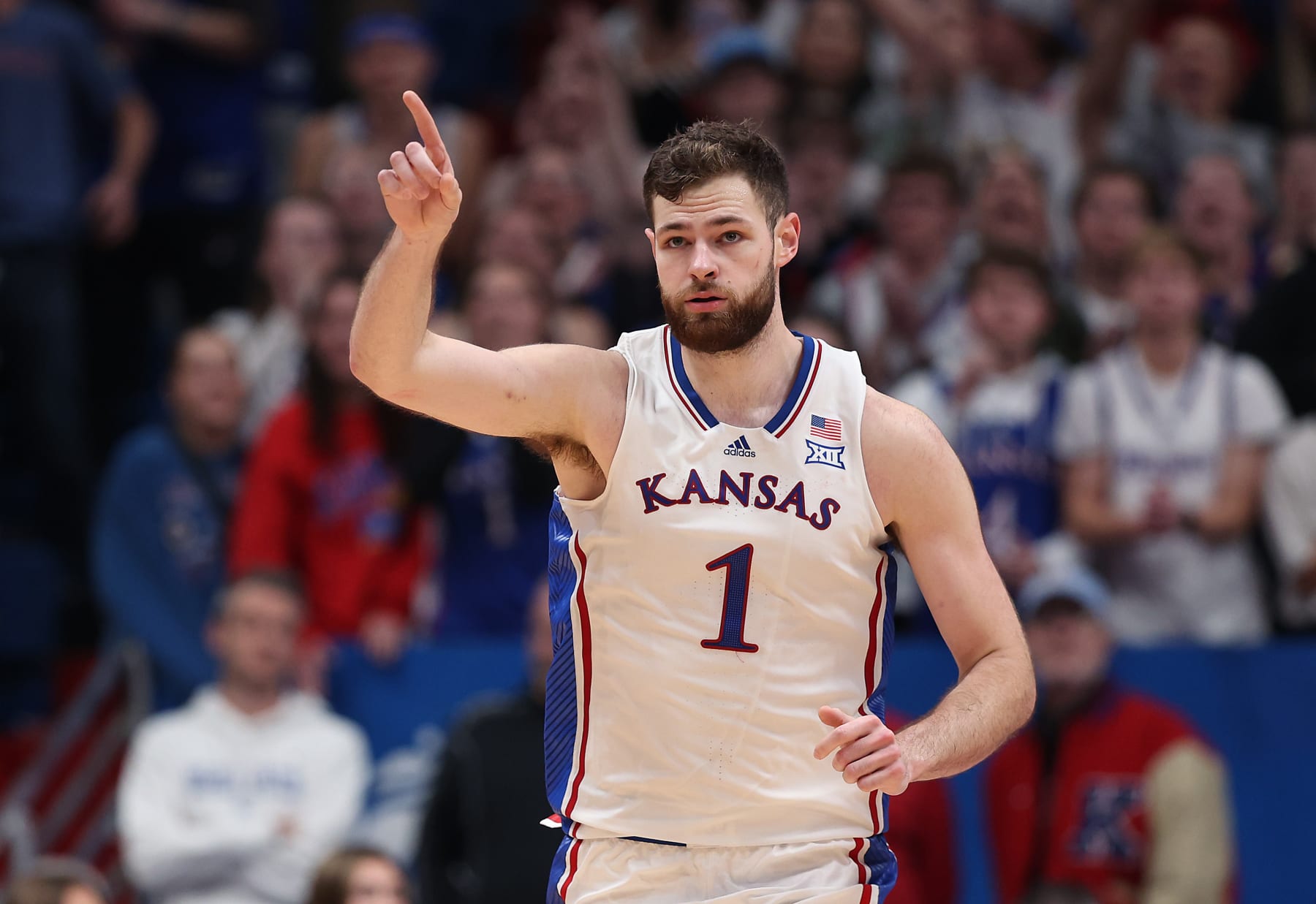 LAWRENCE, KANSAS - NOVEMBER 28:  Hunter Dickinson #1 of the Kansas Jayhawks reacts after scoring during the 2nd half of the game against the Eastern Illinois Panthers at Allen Fieldhouse on November 28, 2023 in Lawrence, Kansas. (Photo by Jamie Squire/Getty Images)