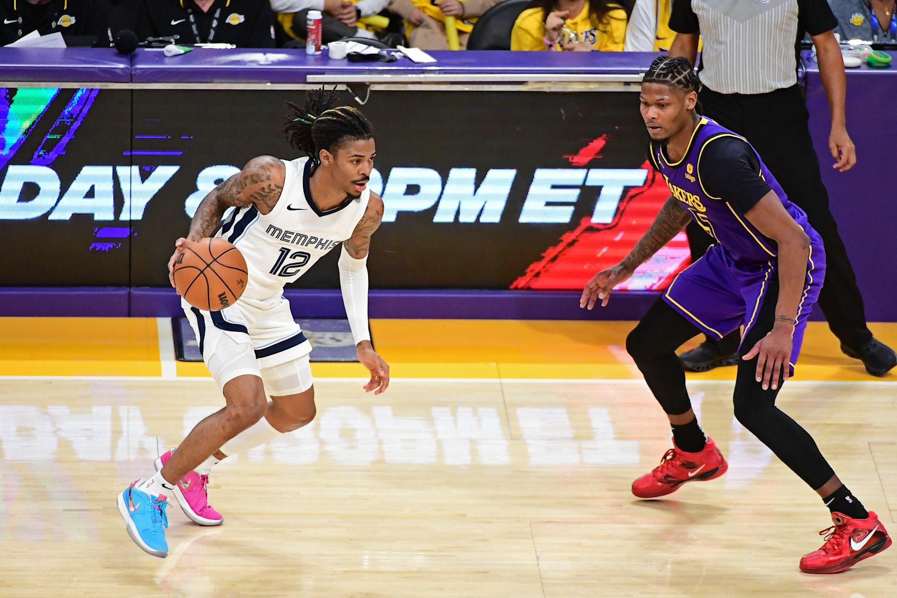 LOS ANGELES, CA - JANUARY 5: Ja Morant #12 of the Memphis Grizzlies handles the ball during the game against the Los Angeles Lakers on January 5, 2024 at Crypto.Com Arena in Los Angeles, California. NOTE TO USER: User expressly acknowledges and agrees that, by downloading and/or using this Photograph, user is consenting to the terms and conditions of the Getty Images License Agreement. Mandatory Copyright Notice: Copyright 2024 NBAE (Photo by Adam Pantozzi/NBAE via Getty Images)