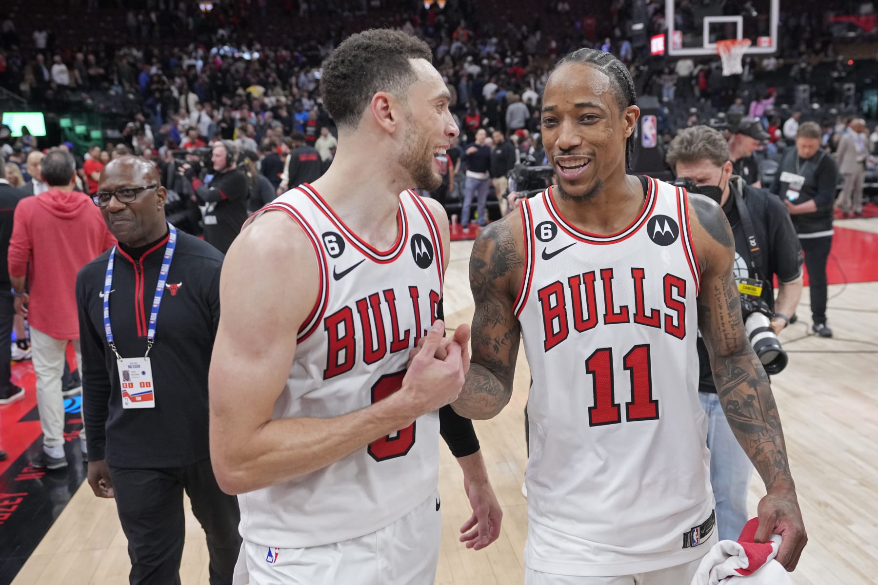 TORONTO, CANADA - APRIL 12: DeMar DeRozan #11 and Zach LaVine #8 of the Chicago Bulls walk off the court after the game against the Toronto Raptors during the 2023 Play-In Tournament on April 12, 2023 at the Scotiabank Arena in Toronto, Ontario, Canada.  NOTE TO USER: User expressly acknowledges and agrees that, by downloading and or using this Photograph, user is consenting to the terms and conditions of the Getty Images License Agreement.  Mandatory Copyright Notice: Copyright 2022 NBAE (Photo by Mark Blinch/NBAE via Getty Images)