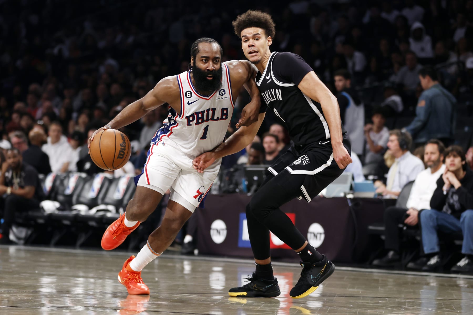 NEW YORK, NEW YORK - APRIL 22: James Harden #1 of the Philadelphia 76ers dribbles against Cameron Johnson #2 of the Brooklyn Nets during the second half of Game Four of the Eastern Conference First Round Playoffs at Barclays Center on April 22, 2023 in the Brooklyn borough of New York City. The 76ers won 96-88. NOTE TO USER: User expressly acknowledges and agrees that, by downloading and or using this photograph, User is consenting to the terms and conditions of the Getty Images License Agreement. (Photo by Sarah Stier/Getty Images)
