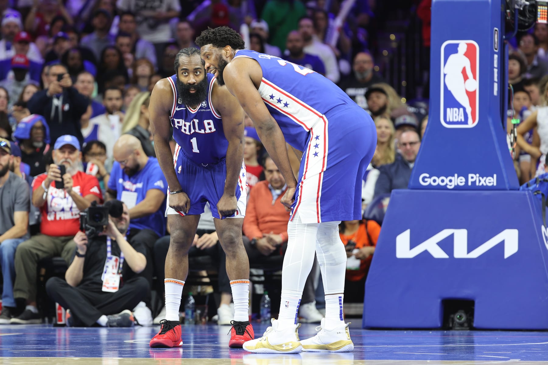 PHILADELPHIA, PENNSYLVANIA - MAY 07: James Harden #1 and Joel Embiid #21 of the Philadelphia 76ers talk against the Boston Celtics during the third quarter in game four of the Eastern Conference Second Round Playoffs at Wells Fargo Center on May 07, 2023 in Philadelphia, Pennsylvania. NOTE TO USER: User expressly acknowledges and agrees that, by downloading and or using this photograph, User is consenting to the terms and conditions of the Getty Images License Agreement. (Photo by Tim Nwachukwu/Getty Images)