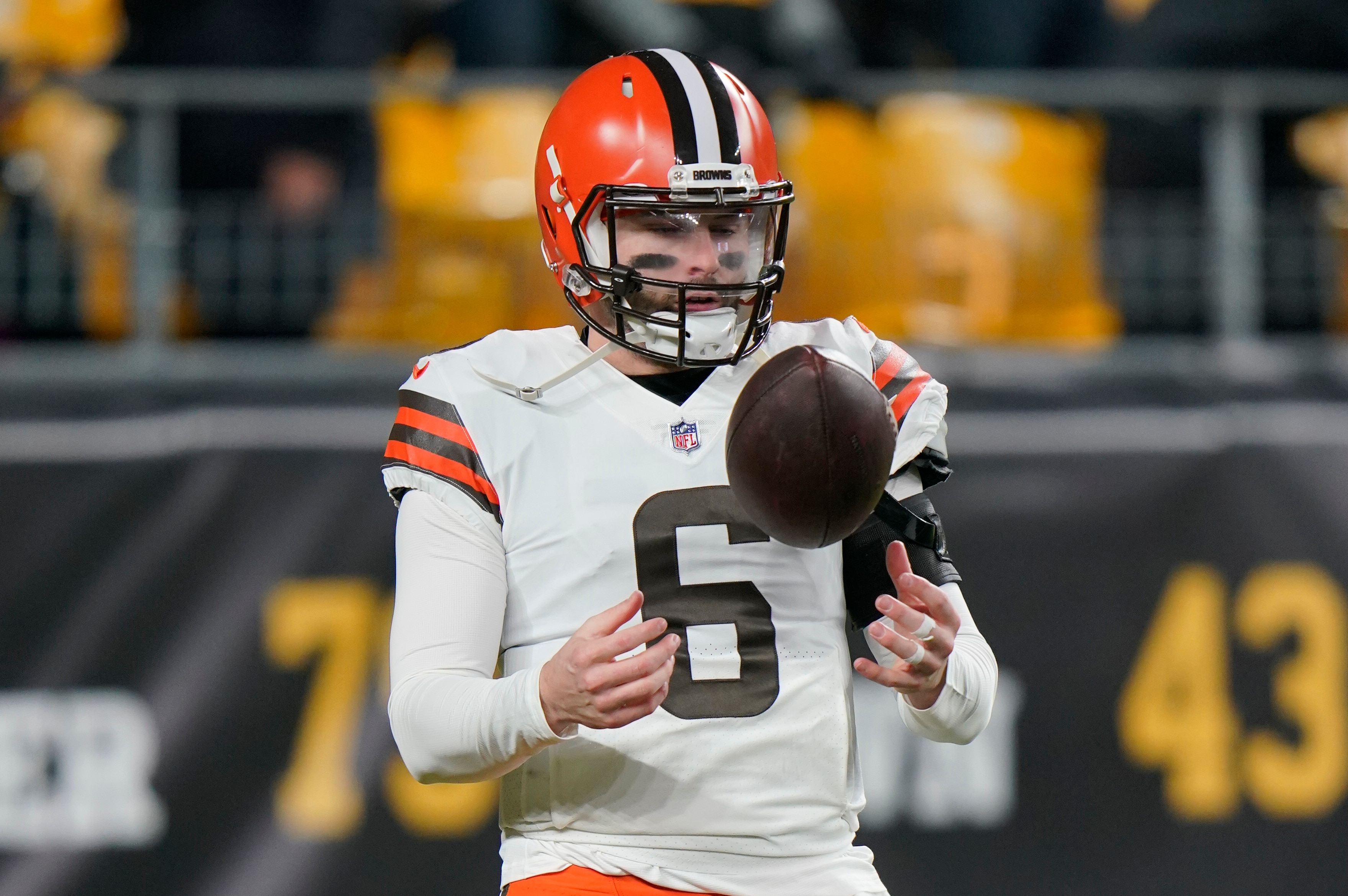 Cleveland Browns quarterback Baker Mayfield (6) warms up before an NFL football game against the Pittsburgh Steelers, Monday, Jan. 3, 2022, in Pittsburgh. (AP Photo/Gene J. Puskar)