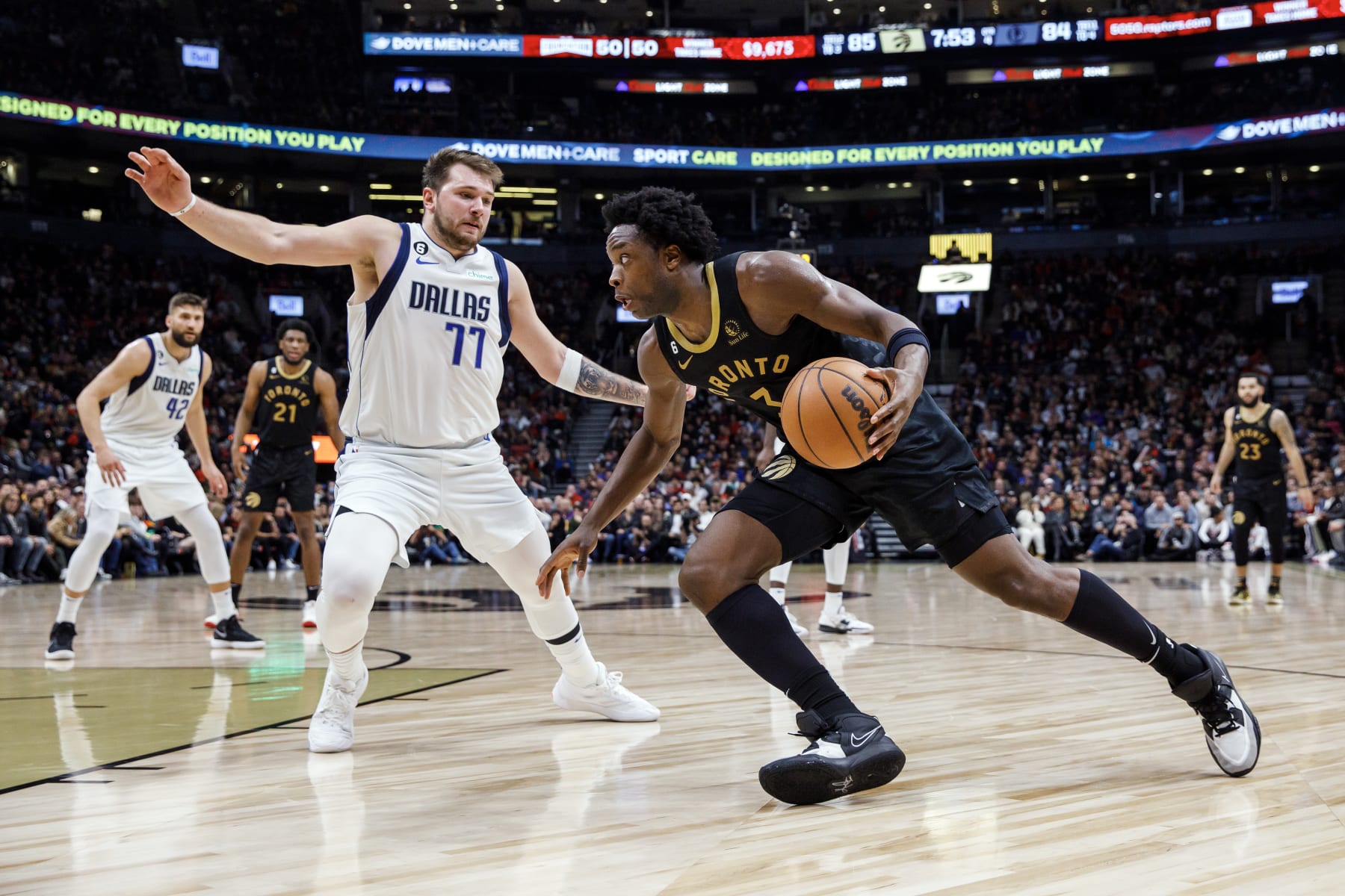 TORONTO, ON - NOVEMBER 26: Luka Doncic #77 of the Dallas Mavericks defends the net against O.G. Anunoby #3 of the Toronto Raptors during the second half of their NBA game at Scotiabank Arena on November 26, 2022 in Toronto, Canada. NOTE TO USER: User expressly acknowledges and agrees that, by downloading and or using this photograph, User is consenting to the terms and conditions of the Getty Images License Agreement. (Photo by Cole Burston/Getty Images)