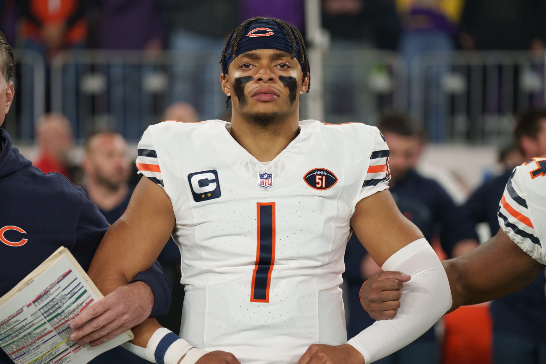 MINNEAPOLIS, MINNESOTA - NOVEMBER 27: Quarterback Justin Fields #1 of the Chicago Bears stands during the national anthem prior to an NFL football game against the Minnesota Vikings at U.S. Bank Stadium on November 27, 2023 in Minneapolis, Minnesota. (Photo by Todd Rosenberg/Getty Images)