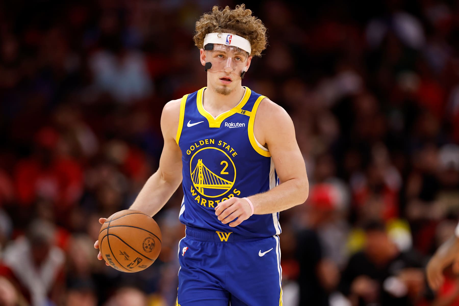 HOUSTON, TEXAS - NOVEMBER 02: Brandin Podziemski #2 of the Golden State Warriors brings the ball up court in the second half against the Houston Rockets at Toyota Center on November 02, 2024 in Houston, Texas.  NOTE TO USER: User expressly acknowledges and agrees that, by downloading and or using this photograph, User is consenting to the terms and conditions of the Getty Images License Agreement.  (Photo by Tim Warner/Getty Images)