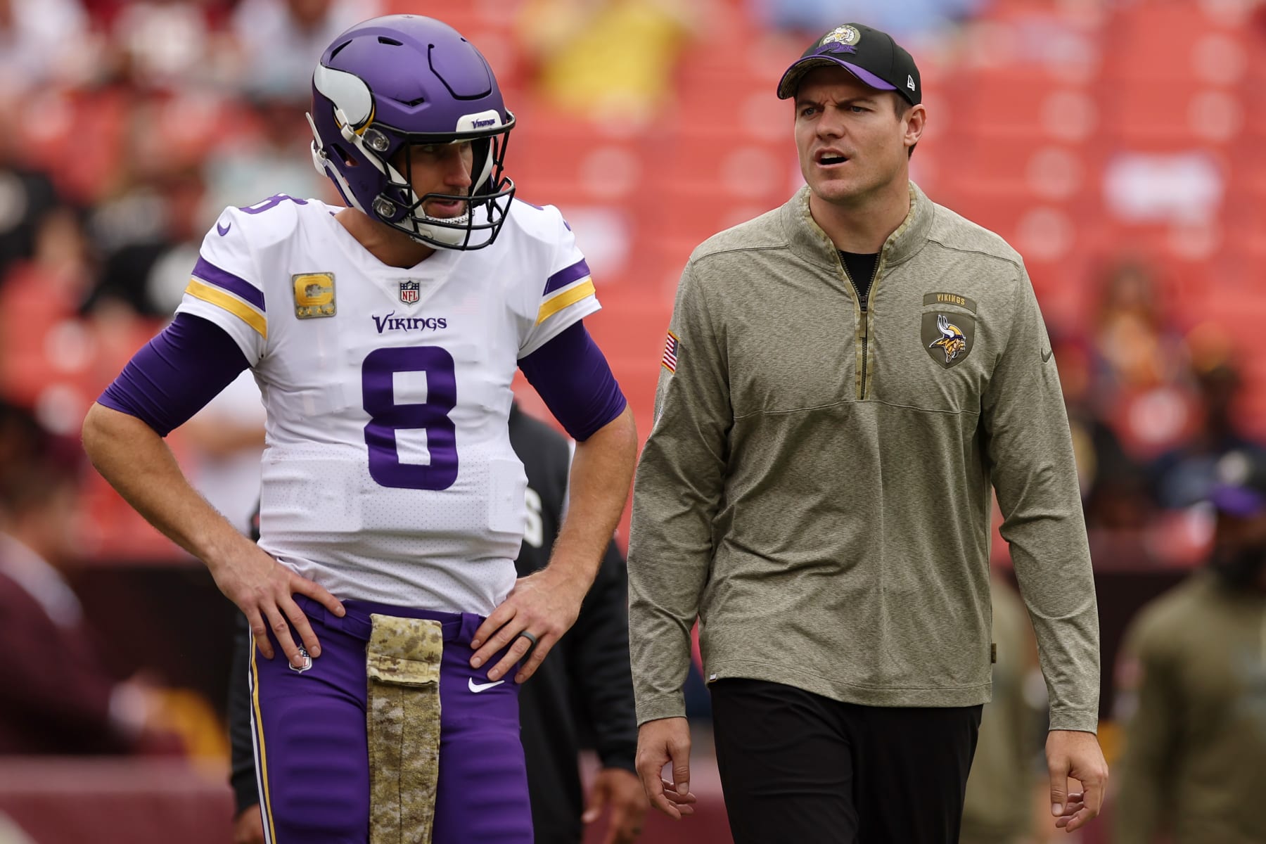 LANDOVER, MARYLAND - NOVEMBER 06: Kirk Cousins #8 talks with head coach Kevin O'Connell of the Minnesota Vikings prior to the game against the Washington Commanders at FedExField on November 06, 2022 in Landover, Maryland. (Photo by Scott Taetsch/Getty Images)