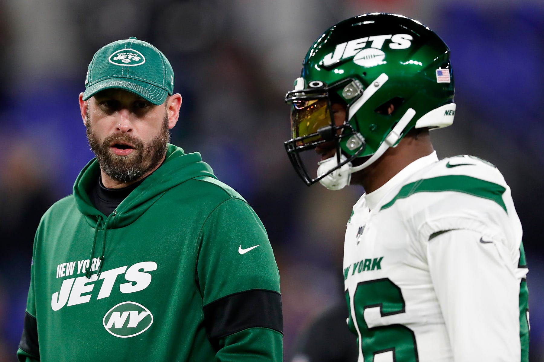 BALTIMORE, MARYLAND - DECEMBER 12: Head coach Adam Gase of the New York Jets and running back Le'Veon Bell #26 talk before the game against the Baltimore Ravens at M&T Bank Stadium on December 12, 2019 in Baltimore, Maryland. (Photo by Scott Taetsch/Getty Images)