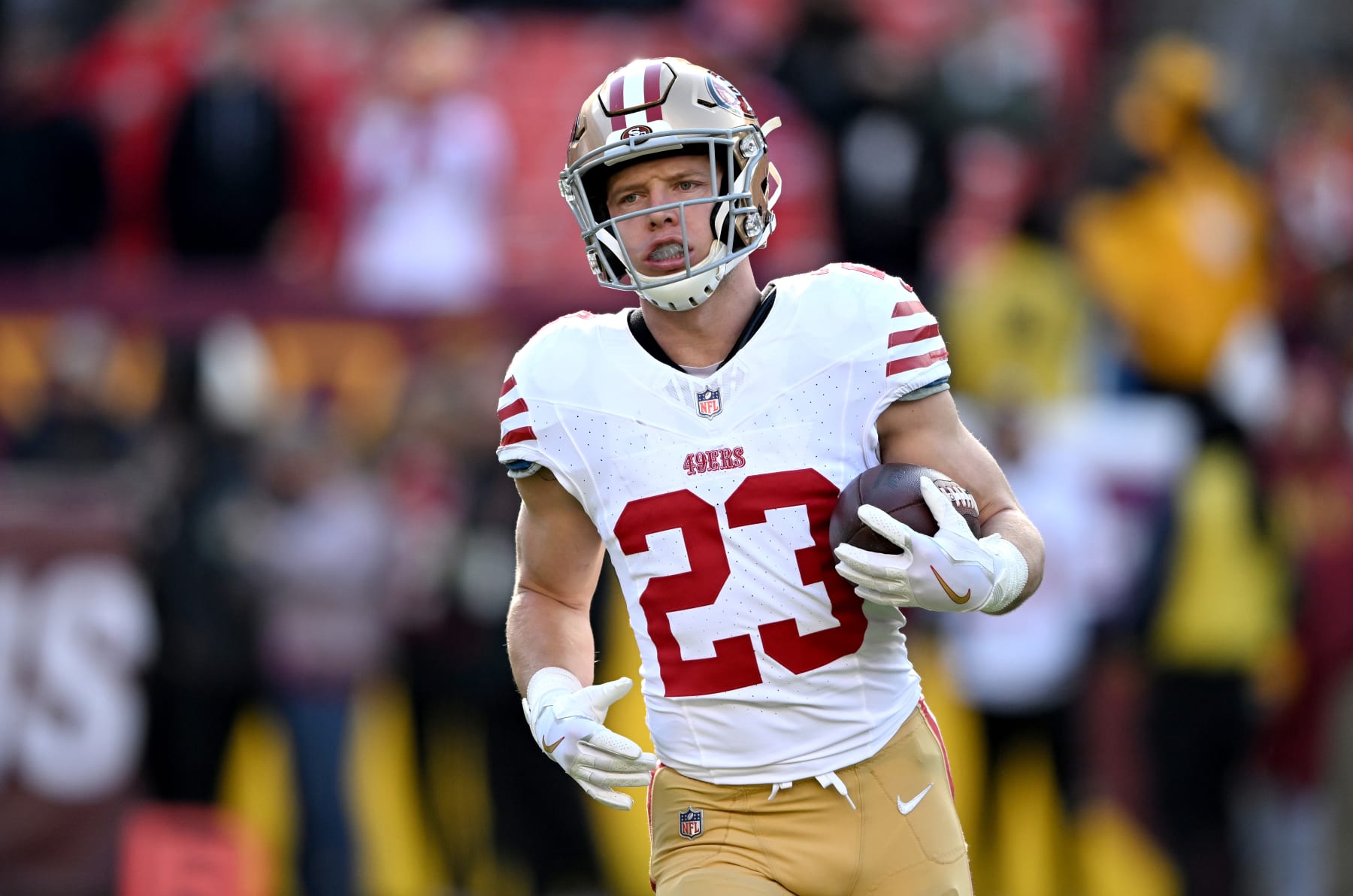 LANDOVER, MARYLAND - DECEMBER 31: Christian McCaffrey #23 of the San Francisco 49ers warms up before the game against the Washington Commanders at FedExField on December 31, 2023 in Landover, Maryland. (Photo by G Fiume/Getty Images)