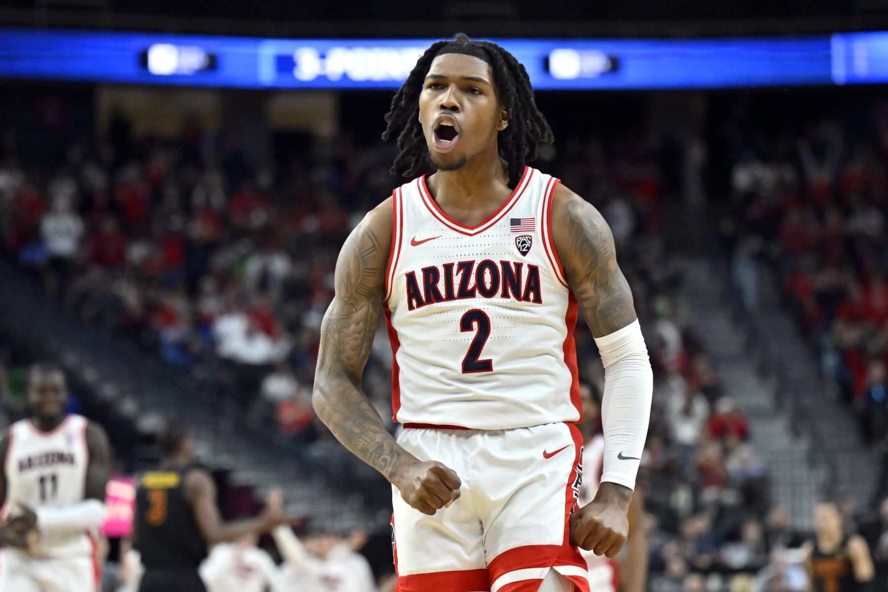 LAS VEGAS, NEVADA - MARCH 14: Caleb Love #2 of the Arizona Wildcats reacts after a 3-pointer against the USC Trojans in the second half of a quarterfinal game of the Pac-12 Conference basketball tournament at T-Mobile Arena on March 14, 2024 in Las Vegas, Nevada. The Wildcats defeated the Trojans 70-49. (Photo by David Becker/Getty Images)