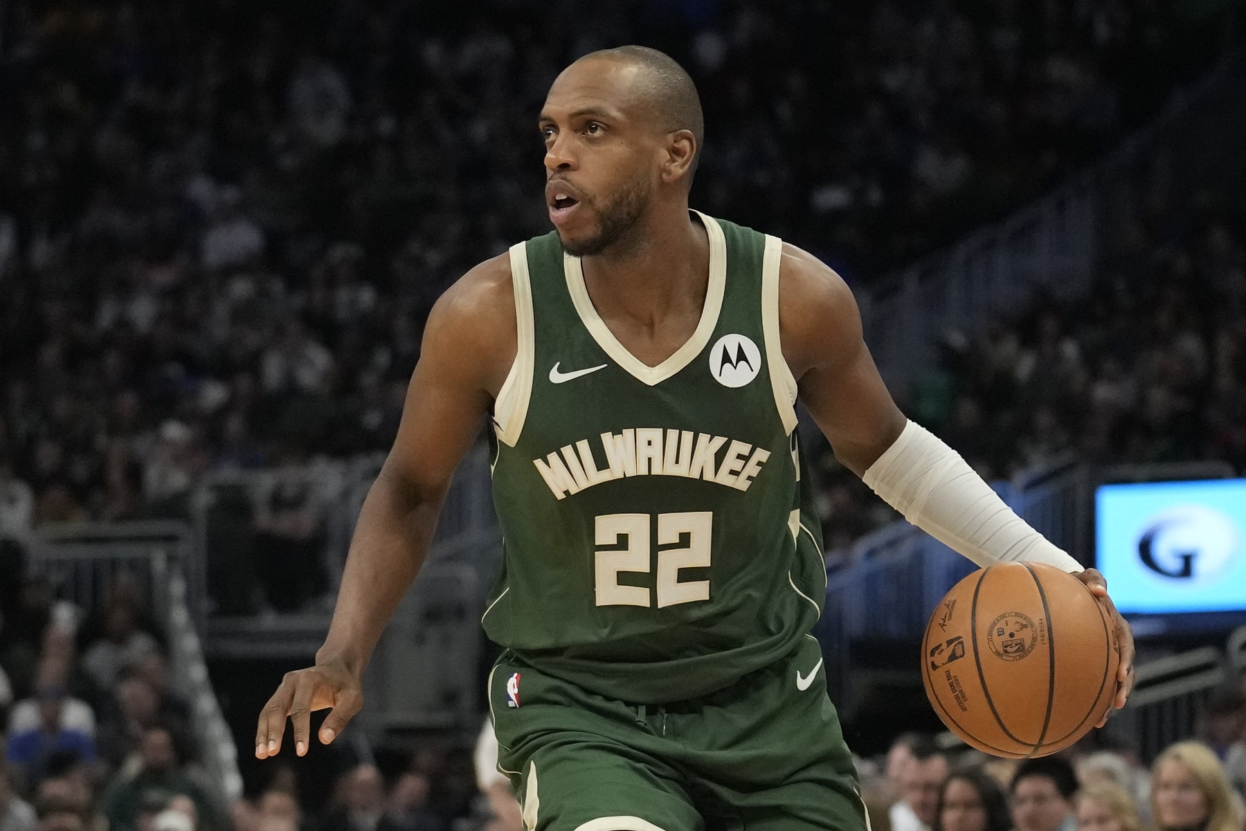 MILWAUKEE, WISCONSIN - MARCH 24: Khris Middleton #22 of the Milwaukee Bucks dribbles the ball during the second half against the Oklahoma City Thunder at Fiserv Forum on March 24, 2024 in Milwaukee, Wisconsin. NOTE TO USER: User expressly acknowledges and agrees that, by downloading and or using this photograph, User is consenting to the terms and conditions of the Getty Images License Agreement. (Photo by Patrick McDermott/Getty Images)