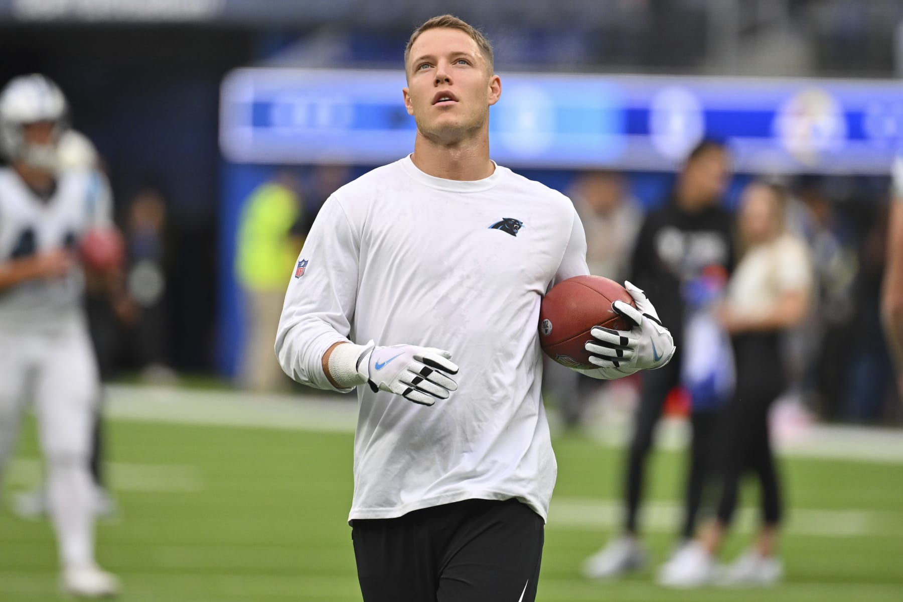 Carolina Panthers running back Christian McCaffrey warms up before an NFL football game against the Los Angeles Rams Sunday, Oct. 16, 2022, in Inglewood, Calif. (AP Photo/Jayne Kamin-Oncea)