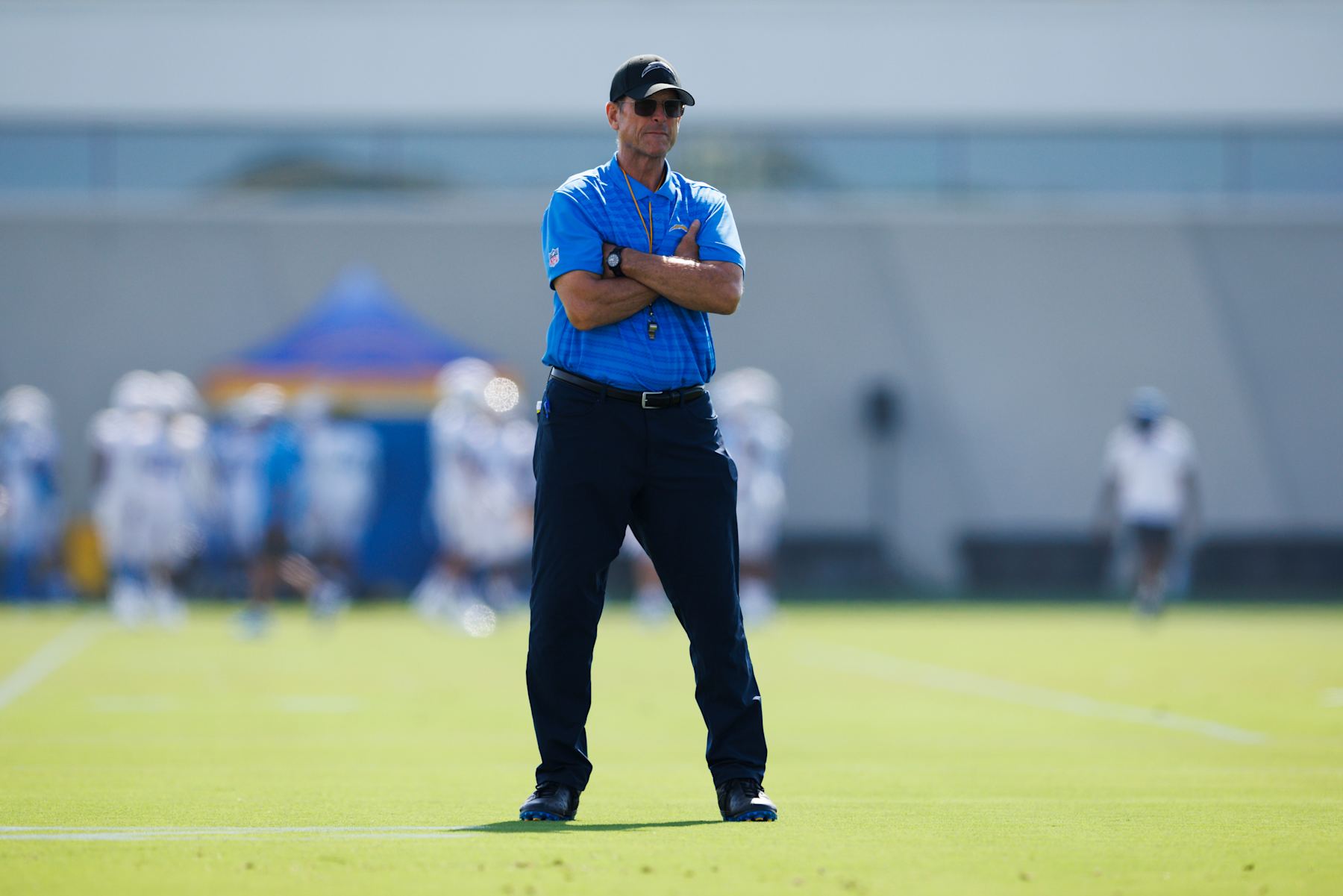 EL SEGUNDO, CALIFORNIA - AUGUST 7: Jim Harbaugh of the Los Angeles Chargers on the field during training camp at The Bolt on August 7, 2024 in El Segundo, California.  (Photo by Ric Tapia/Getty Images)