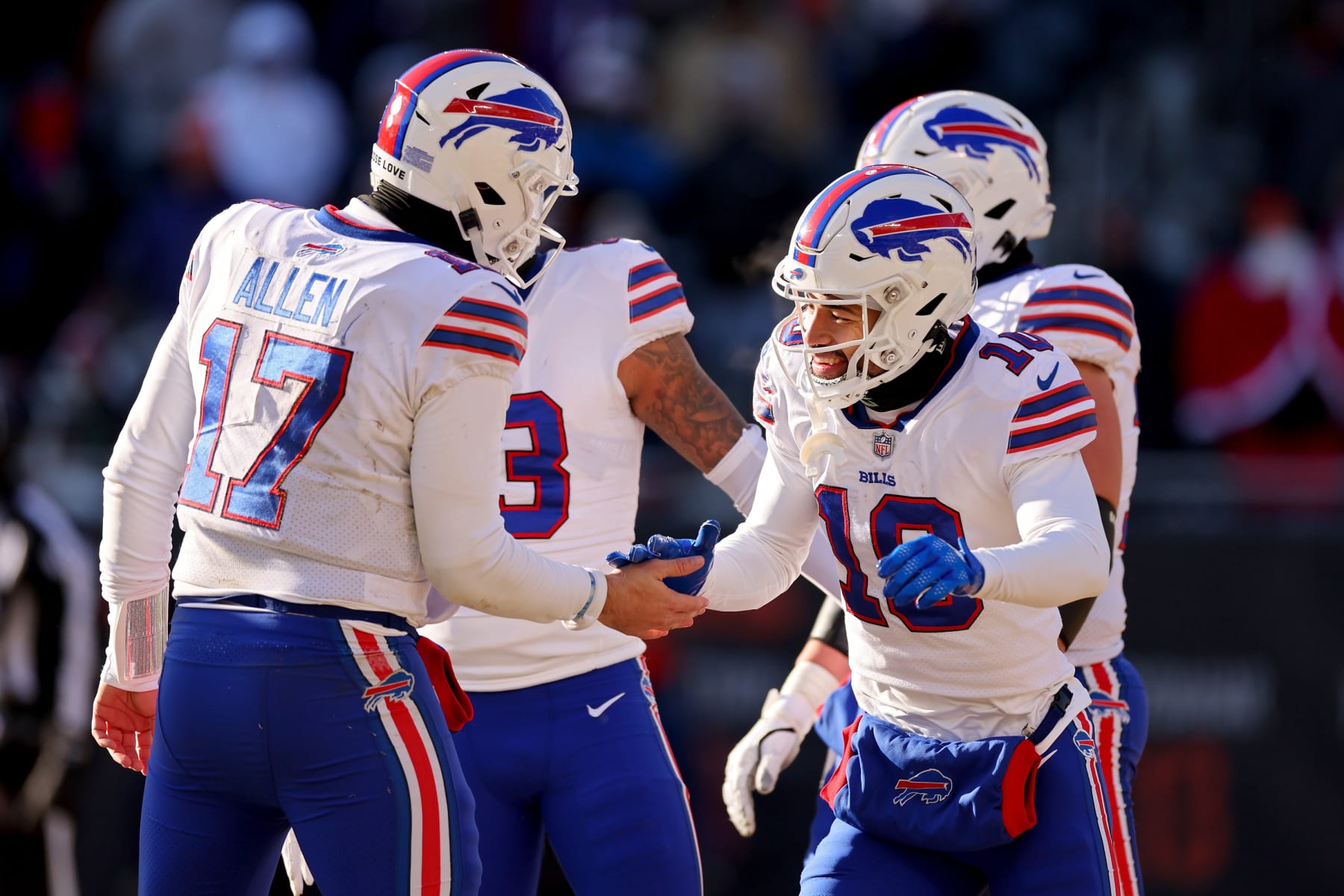 CHICAGO, ILLINOIS - DECEMBER 24: Khalil Shakir #10 and Josh Allen #17 of the Buffalo Bills celebrate a two point conversion during the third quarter in the game against the Chicago Bears at Soldier Field on December 24, 2022 in Chicago, Illinois. (Photo by Michael Reaves/Getty Images)