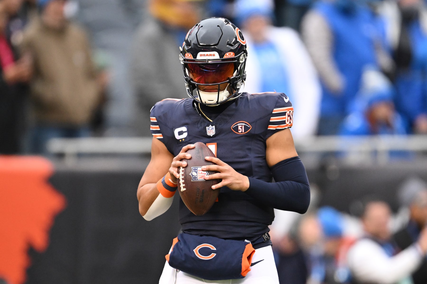 CHICAGO, ILLINOIS - DECEMBER 10: Justin Fields #1 of the Chicago Bears warms up prior to the game against the Detroit Lions at Soldier Field on December 10, 2023 in Chicago, Illinois. (Photo by Quinn Harris/Getty Images)