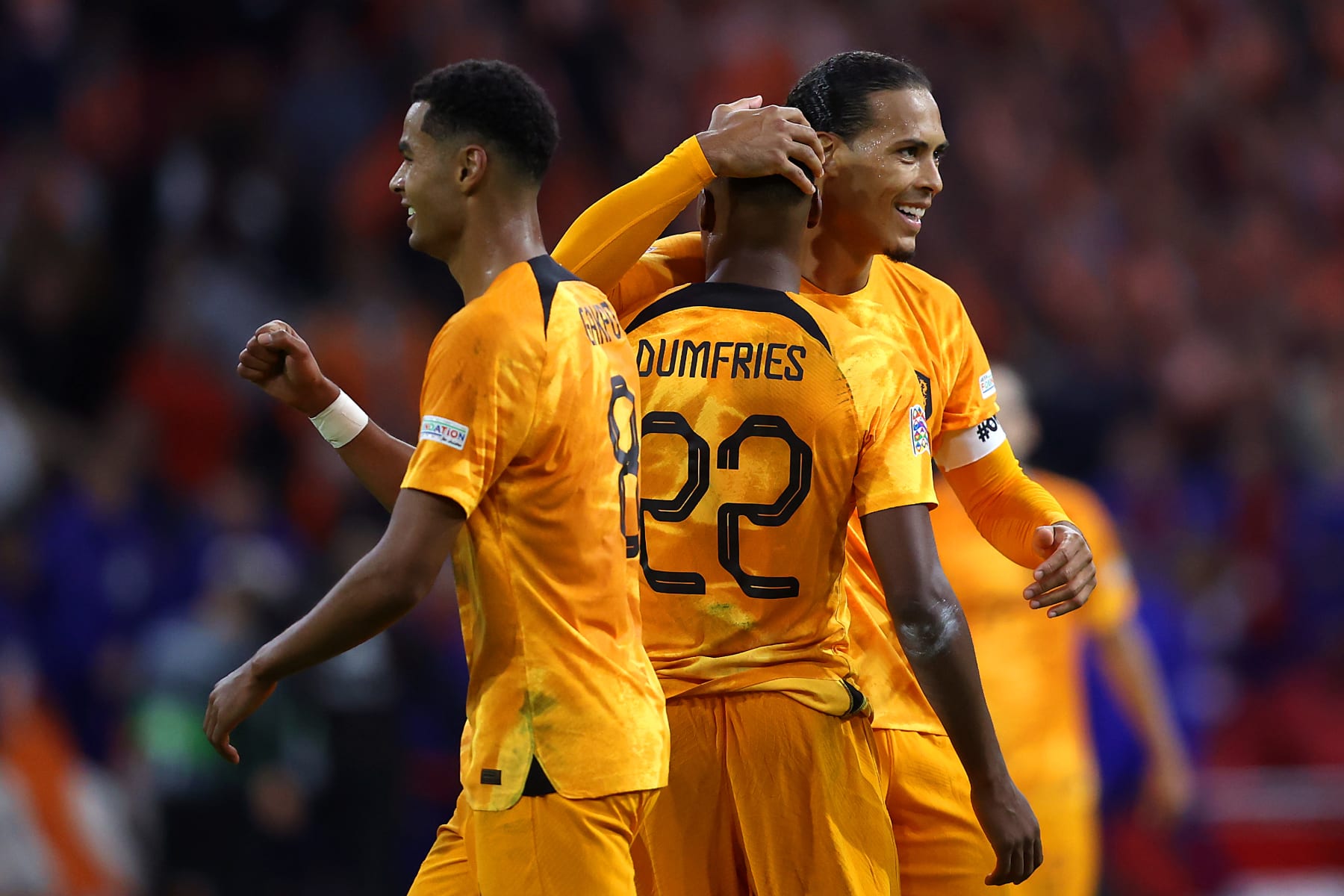 AMSTERDAM, NETHERLANDS - SEPTEMBER 25: Virgil van Dijk of Netherlands celebrates victory with teammate Denzel Dumfries following the UEFA Nations League League A Group 4 match between Netherlands and Belgium at Johan Cruijff ArenA on September 25, 2022 in Amsterdam, Netherlands. (Photo by Dean Mouhtaropoulos/Getty Images)