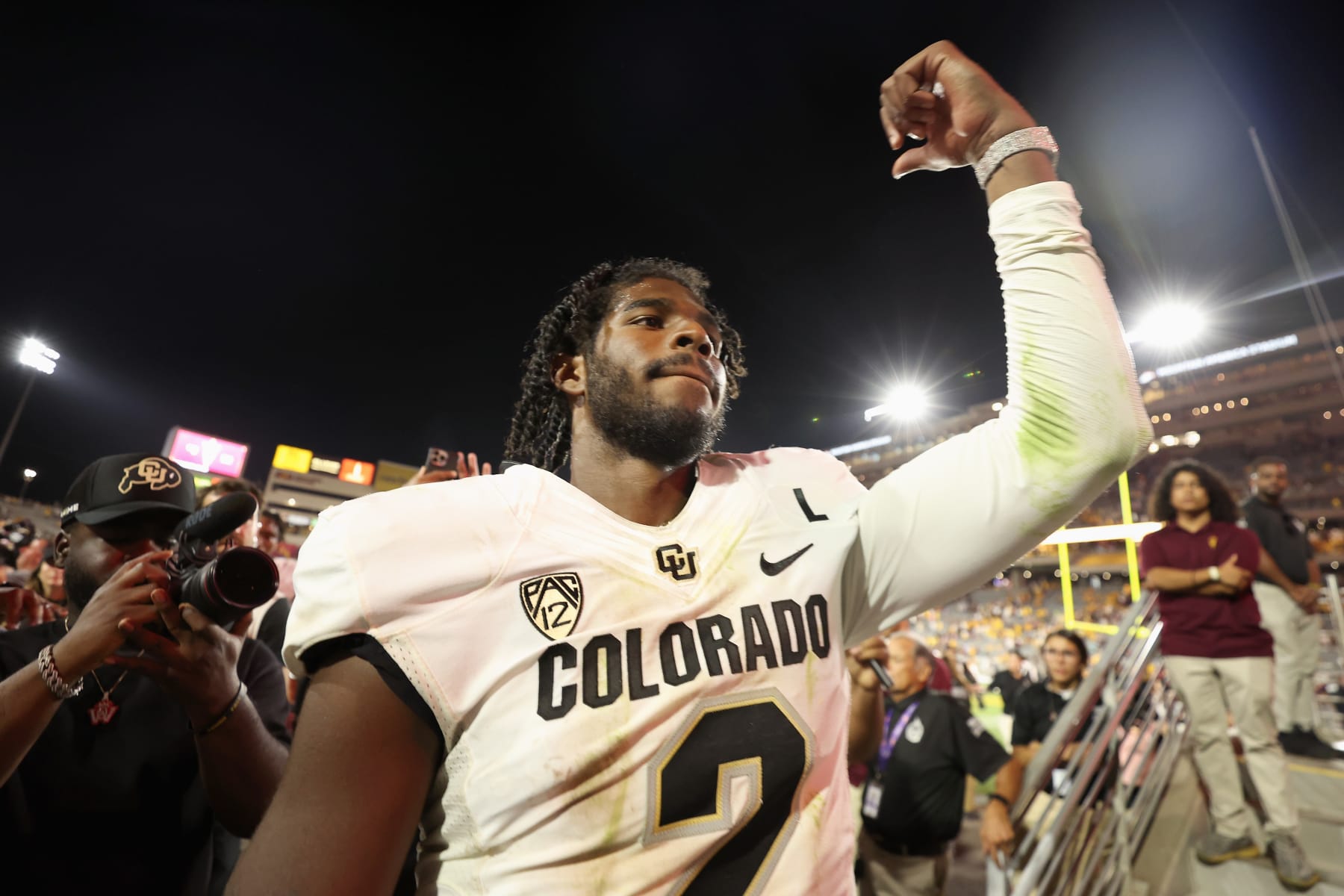 TEMPE, ARIZONA - OCTOBER 07: Quarterback Shedeur Sanders #2 of the Colorado Buffaloes celebrates as he walks off the field following the NCAAF game against the Arizona State Sun Devils at Mountain America Stadium on October 07, 2023 in Tempe, Arizona. The Buffaloes defeated the Sun Devils 27-24.  (Photo by Christian Petersen/Getty Images)