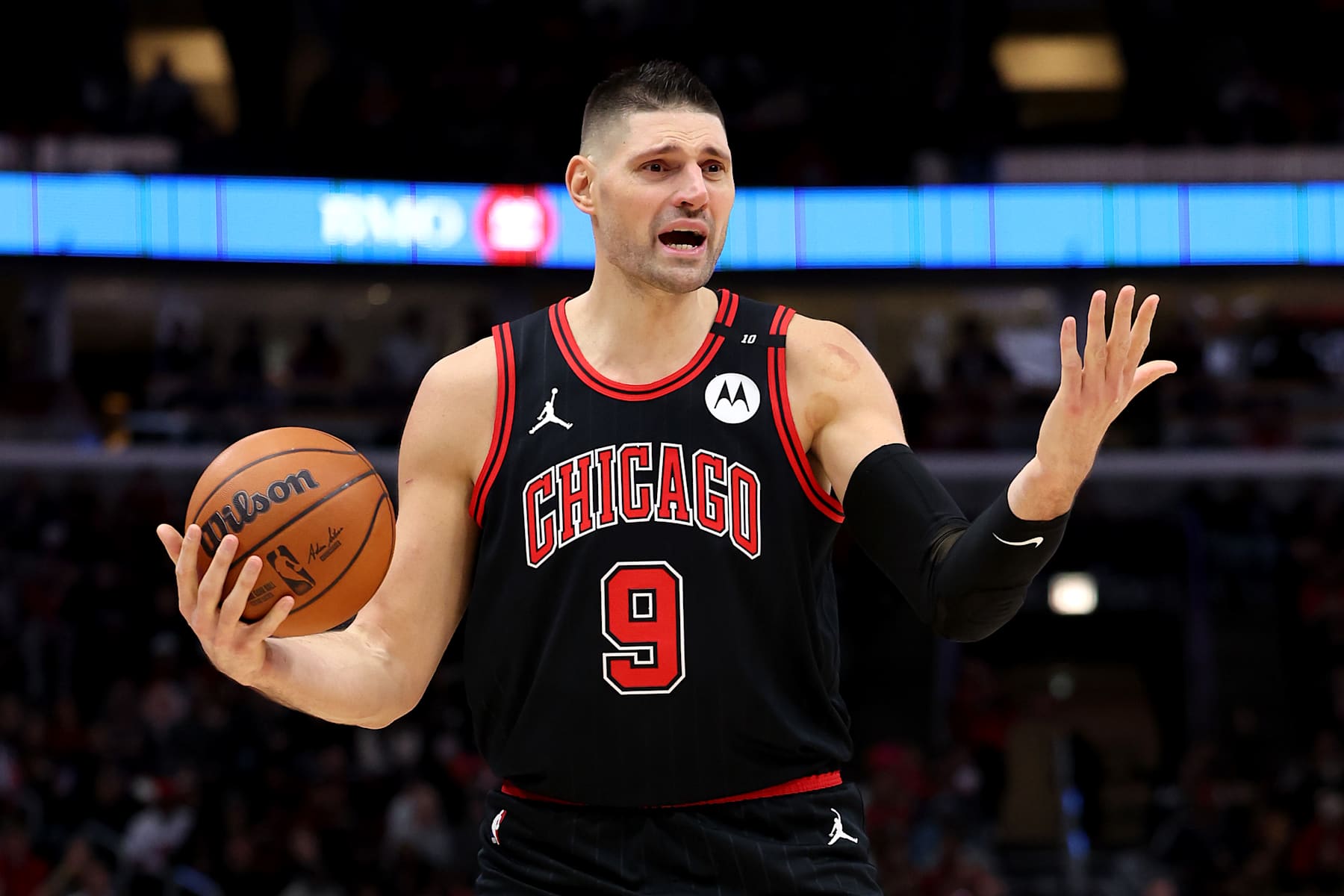 CHICAGO, ILLINOIS - JANUARY 17: Nikola Vucevic #9 of the Chicago Bulls reacts against the Charlotte Hornets during the third quarter at the United Center on January 17, 2025 in Chicago, Illinois. NOTE TO USER: User expressly acknowledges and agrees that, by downloading and or using this photograph, user is consenting to the terms and conditions of the Getty Images License Agreement.  (Photo by Luke Hales/Getty Images)
