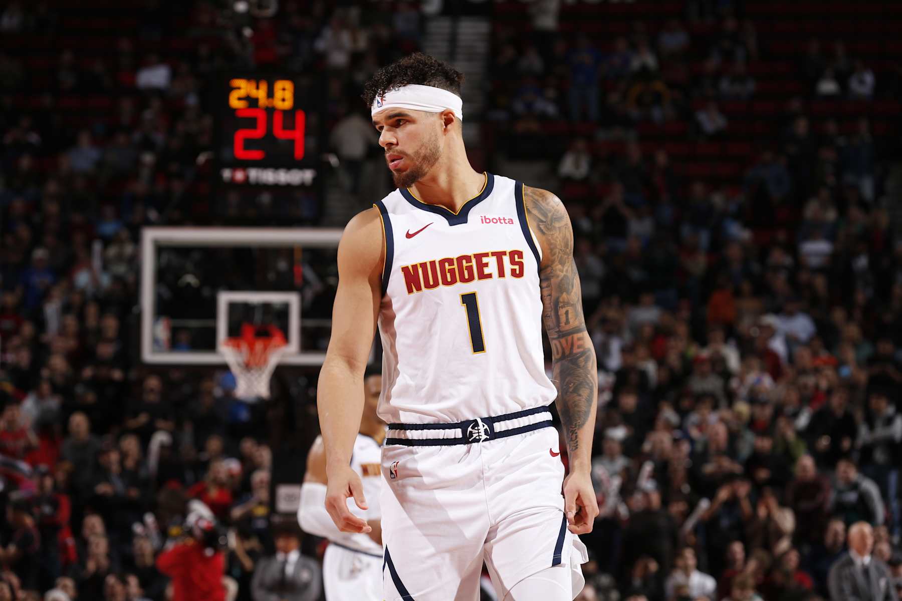 PORTLAND, OR - DECEMBER 19:  Michael Porter Jr. #1 of the Denver Nuggets during the game against the Portland Trail Blazers during a regular season game on December 19, 2024 at the Moda Center Arena in Portland, Oregon. NOTE TO USER: User expressly acknowledges and agrees that, by downloading and or using this photograph, user is consenting to the terms and conditions of the Getty Images License Agreement. Mandatory Copyright Notice: Copyright 2024 NBAE (Photo by Cameron Browne/NBAE via Getty Images)