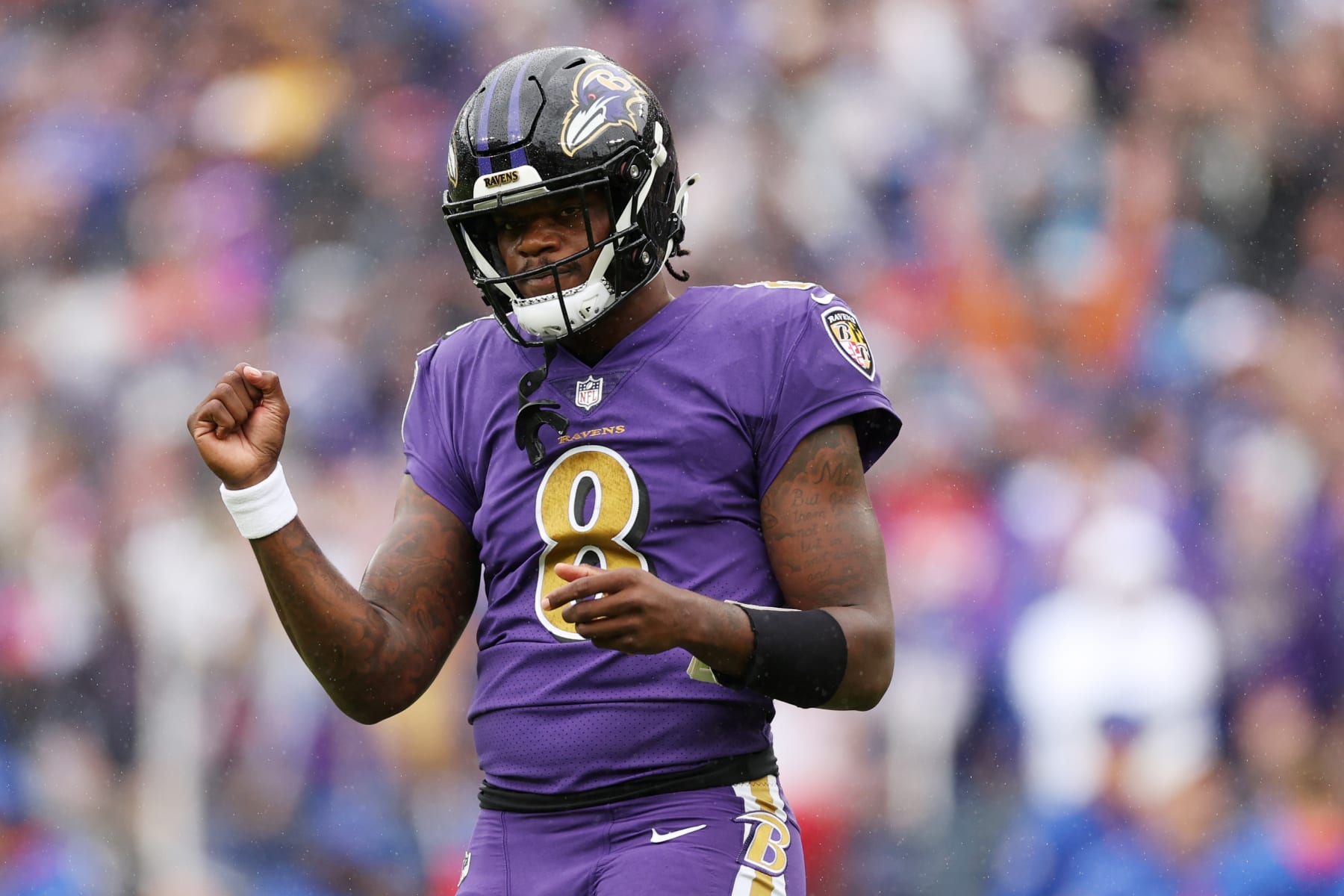 BALTIMORE, MARYLAND - OCTOBER 02: Lamar Jackson #8 of the Baltimore Ravens celebrates after J.K. Dobbins #27 scored a touchdown in the first quarter against the Buffalo Bills at M&T Bank Stadium on October 02, 2022 in Baltimore, Maryland. (Photo by Patrick Smith/Getty Images)